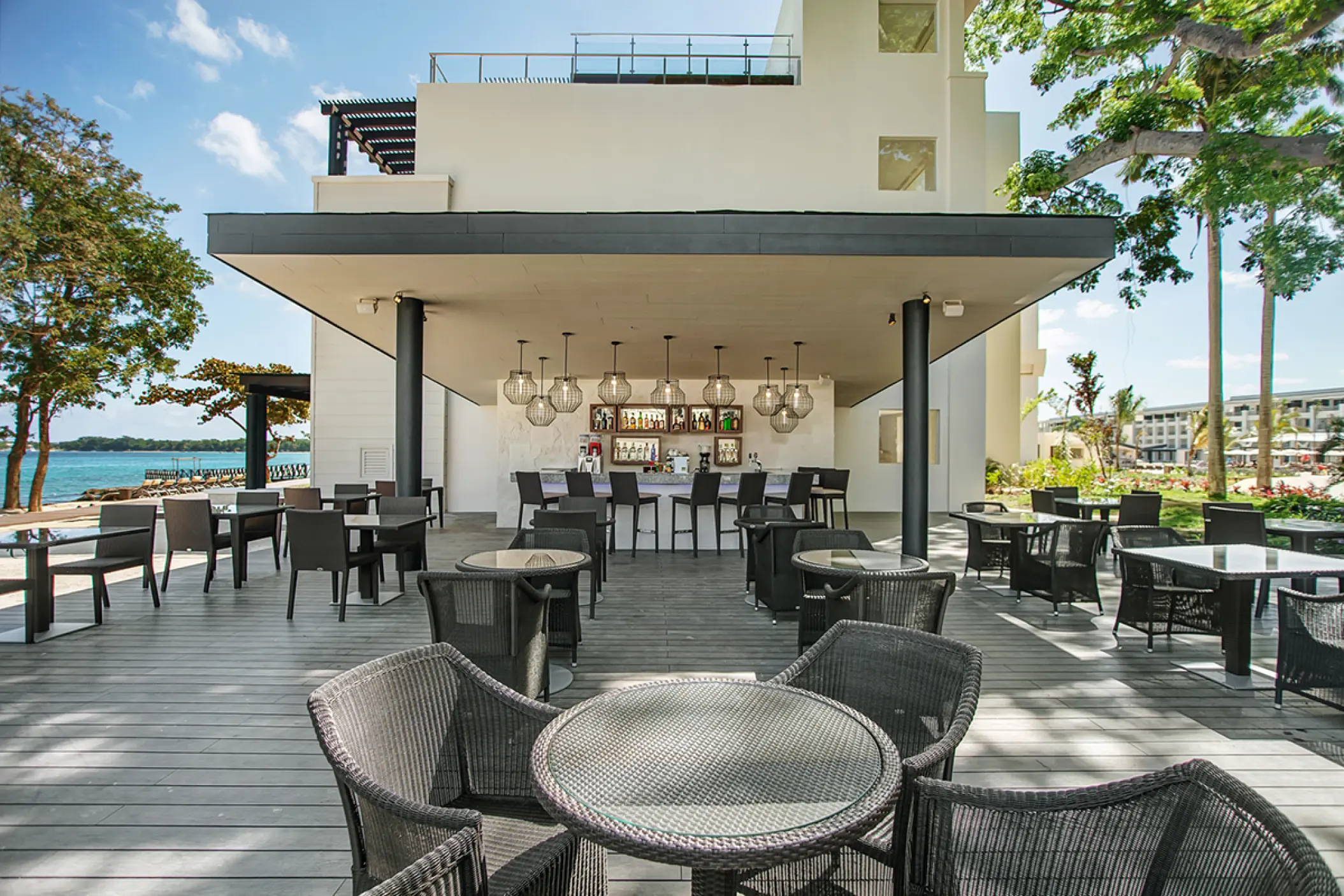 Sands Beach Bar with modern terrace seating at Royalton Hideaway Negril, Negril