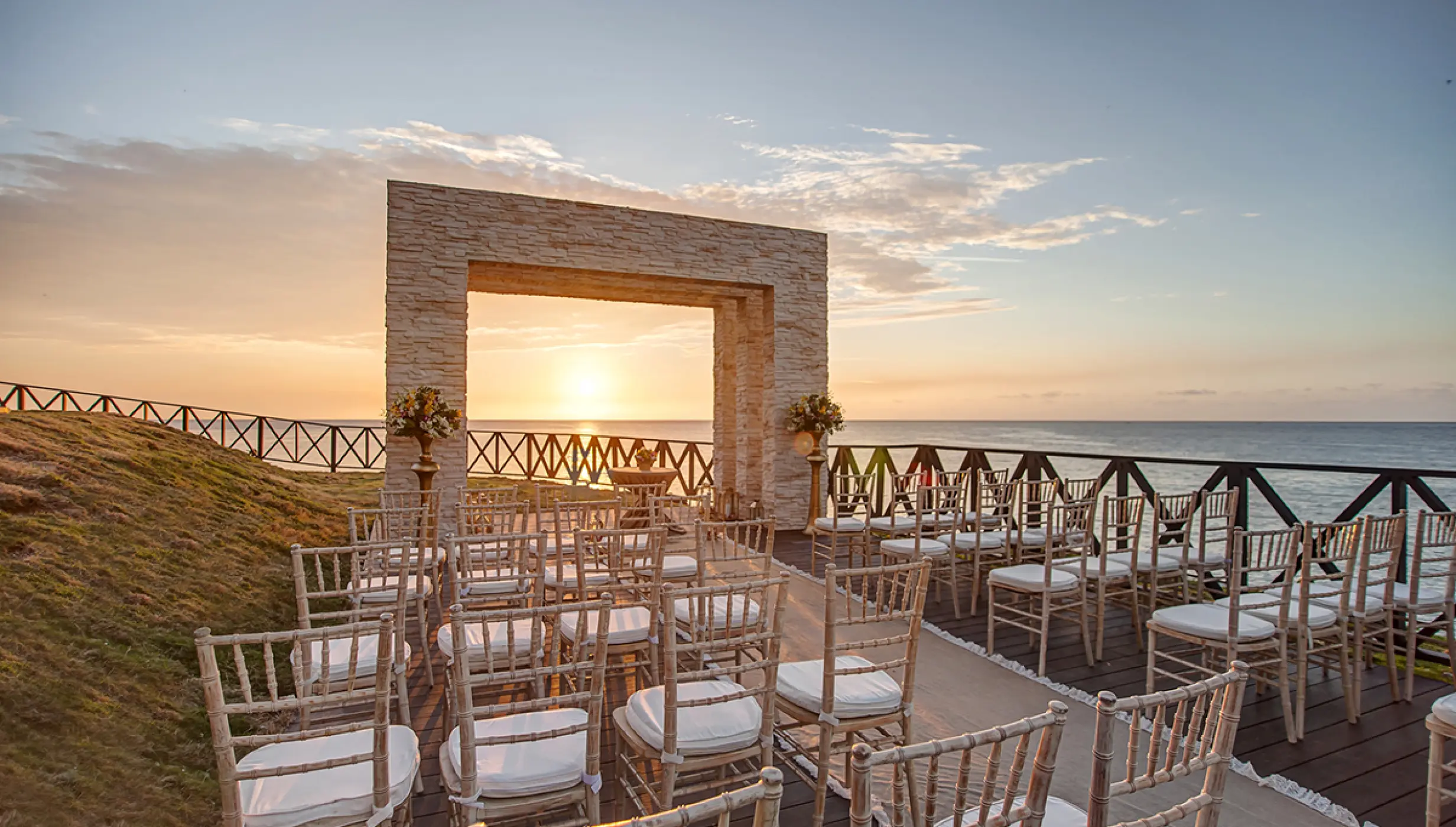 Oceanfront wedding ceremony terrace at sunset at Royalton Hideaway Negril, Negril