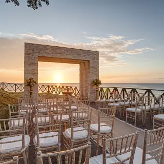 Oceanfront wedding ceremony terrace at sunset at Royalton Hideaway Negril, Negril
