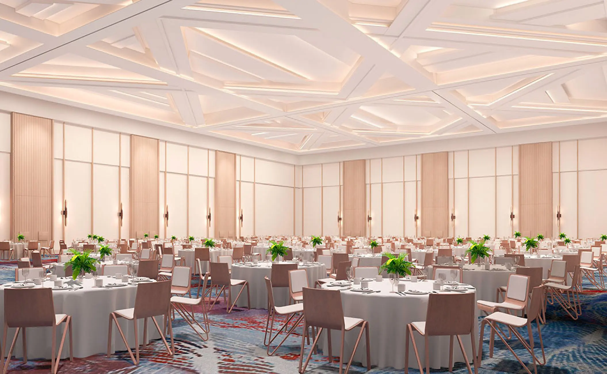Modern ballroom wedding reception with round tables and geometric ceiling at Hilton Cancun, Cancun