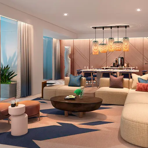 Modern suite living room with floor-to-ceiling ocean views at Hilton Cancun, Cancun
