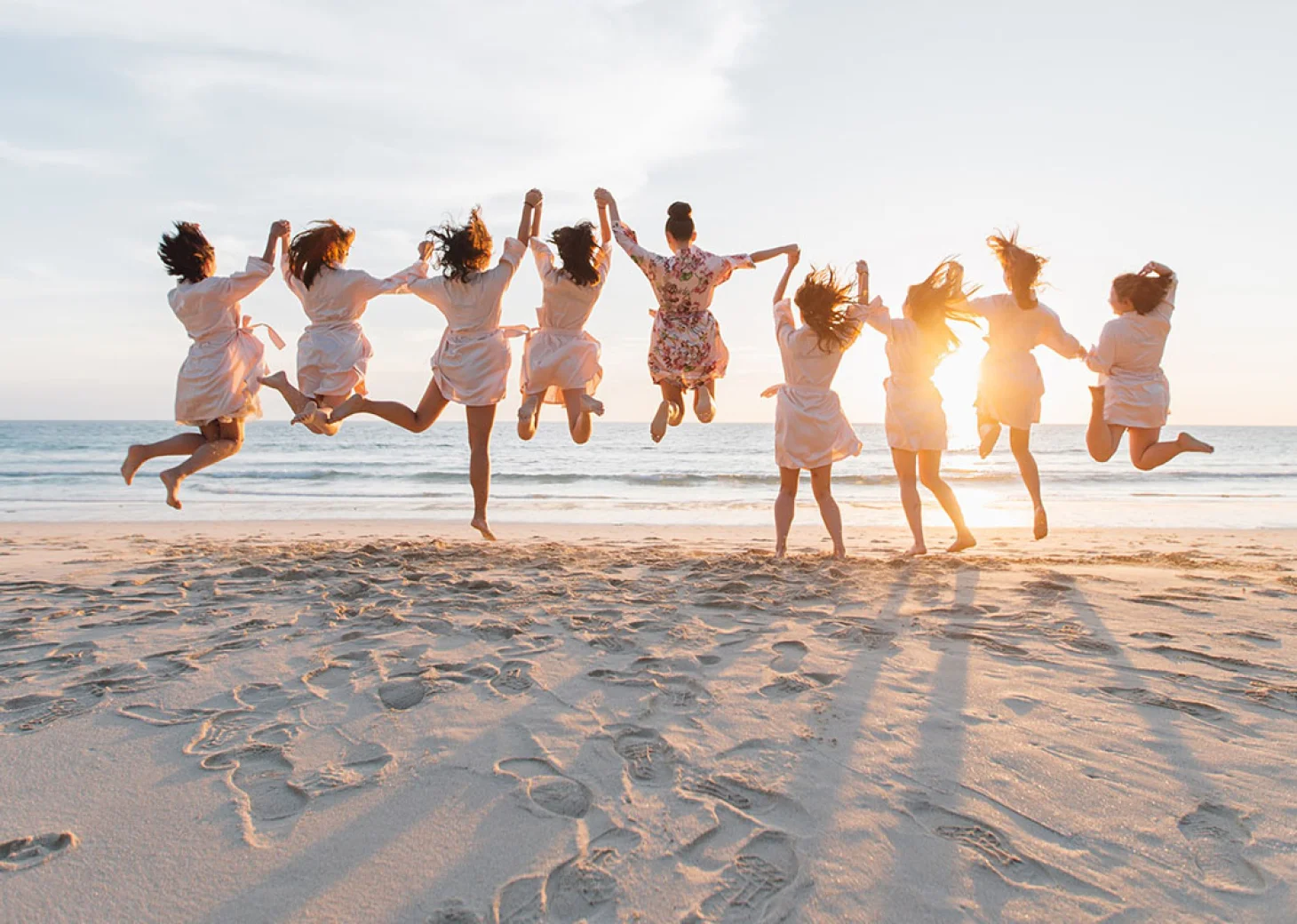 Bride and bridesmaids at the beach in Hilton Cancun.