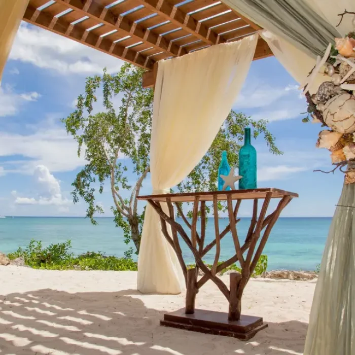 Ceremony decor at the beach gazebo at Secrets La Romana Resort & Spa