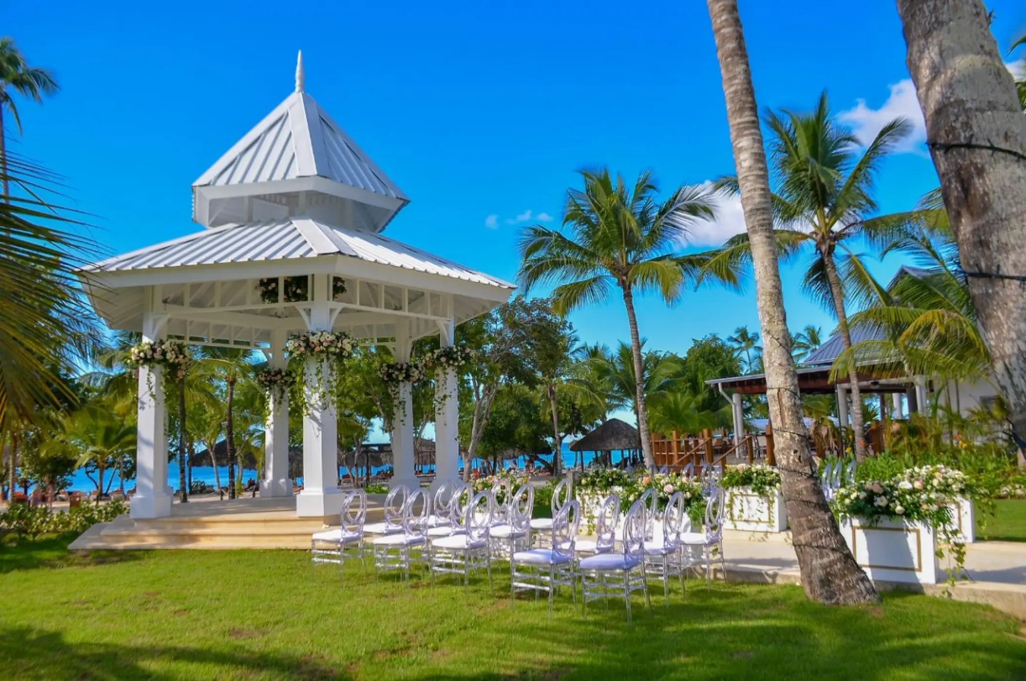 White garden gazebo wedding ceremony setup at Hilton La Romana, La Romana
