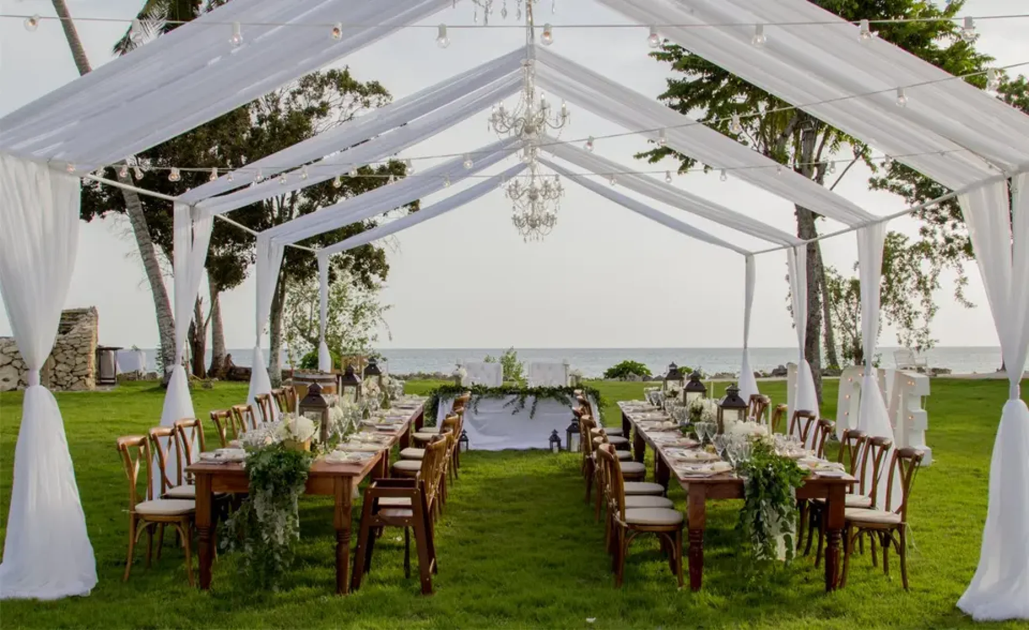 reception dinner setup on the sunset garden at Secrets La Romana