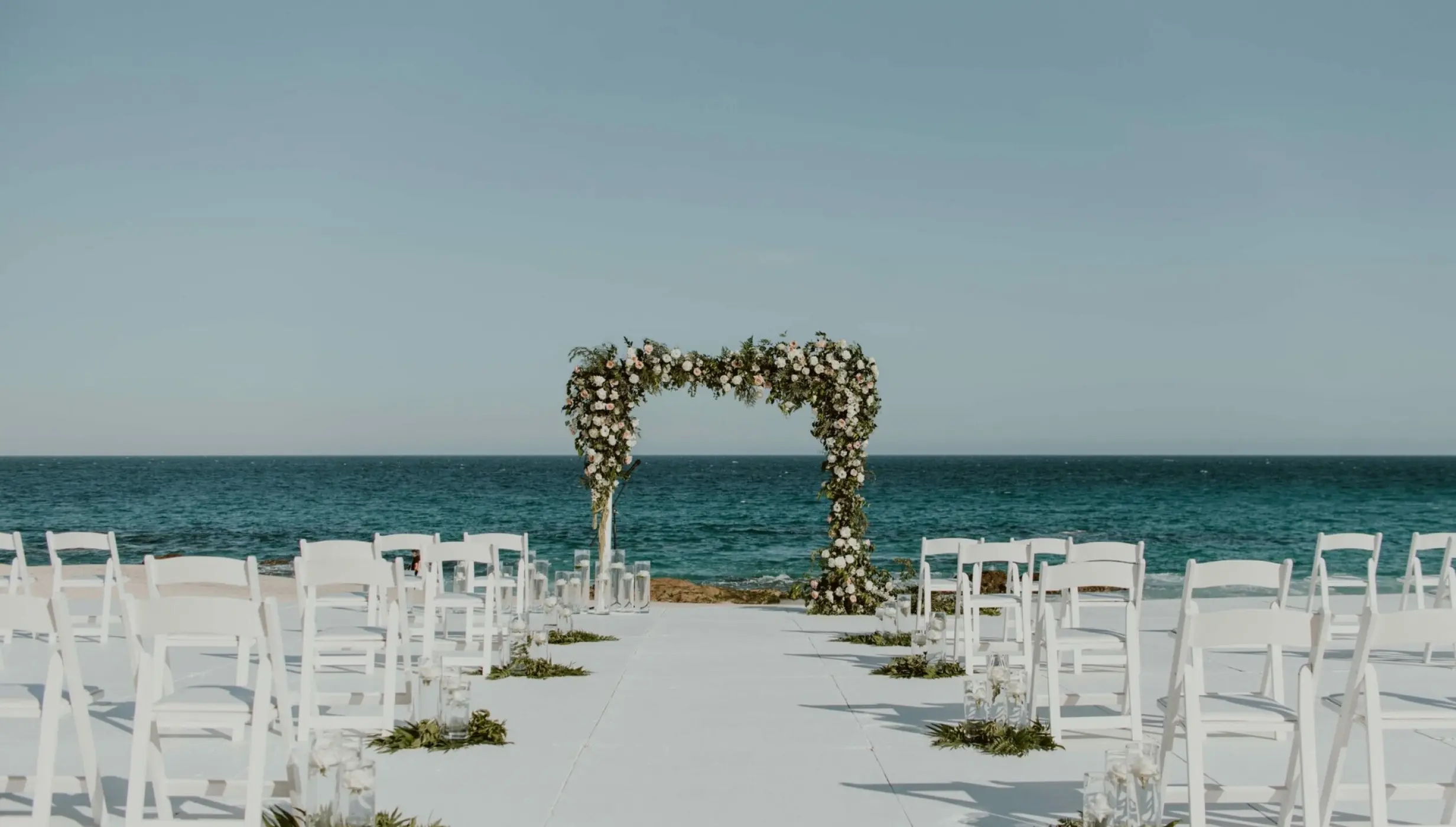 Ceremony decor on the beach wedding venue at Hilton Los Cabos Beach and Golf