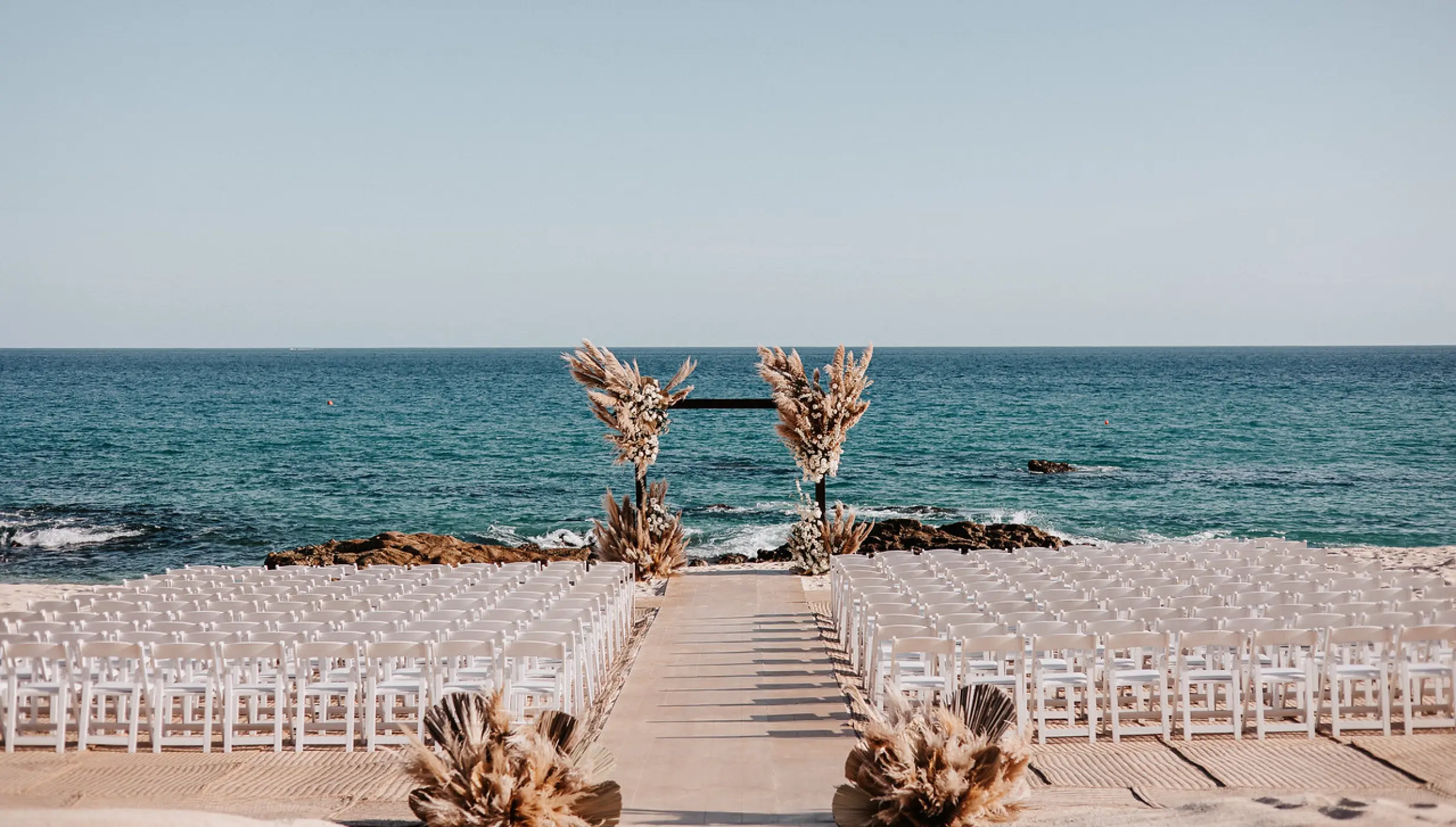 Ceremony decor on the beach at Hilton Los Cabos Beach and Golf
