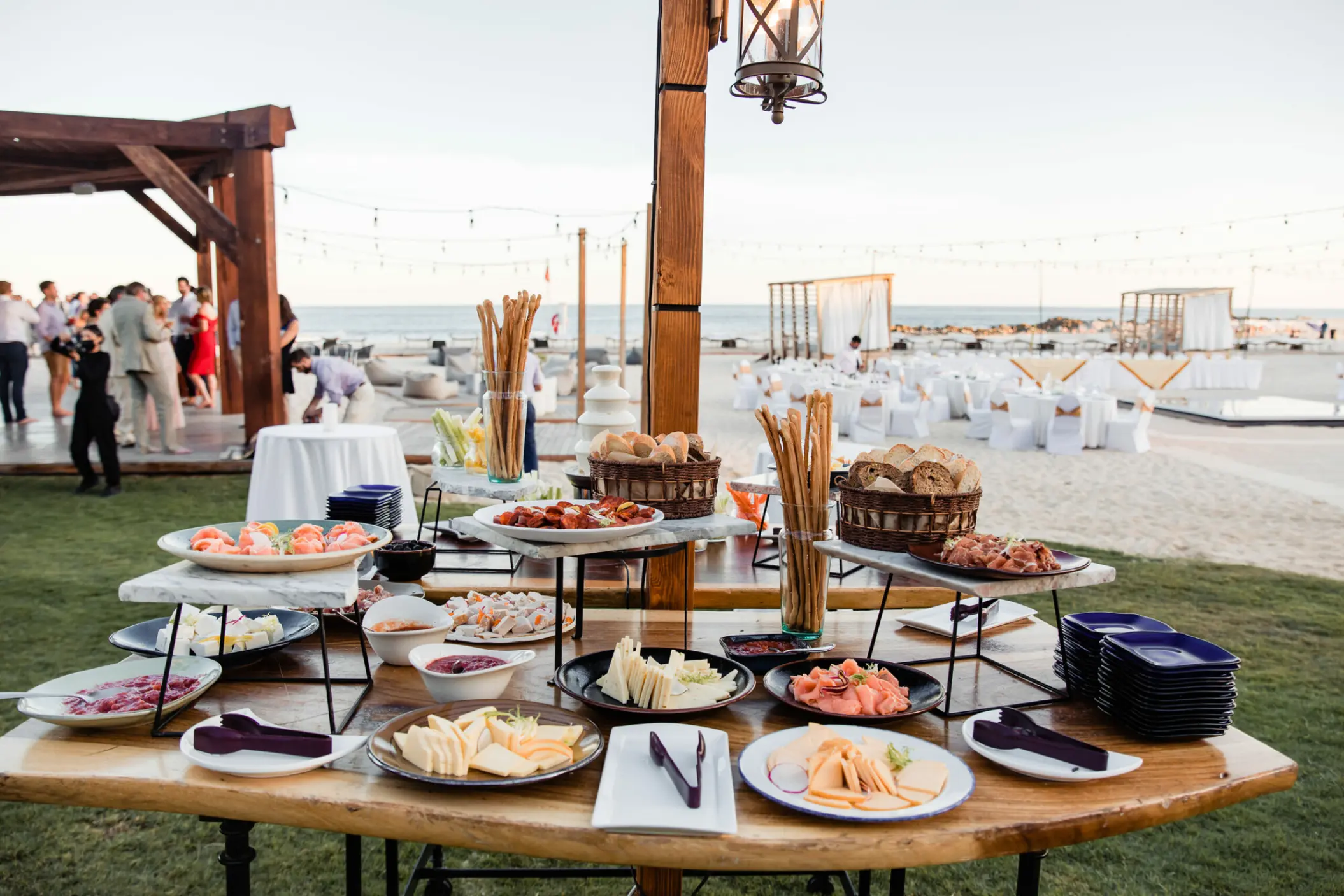 Wedding reception appetizer table with cheeses and meats at Hilton Los Cabos, Cabo San Lucas