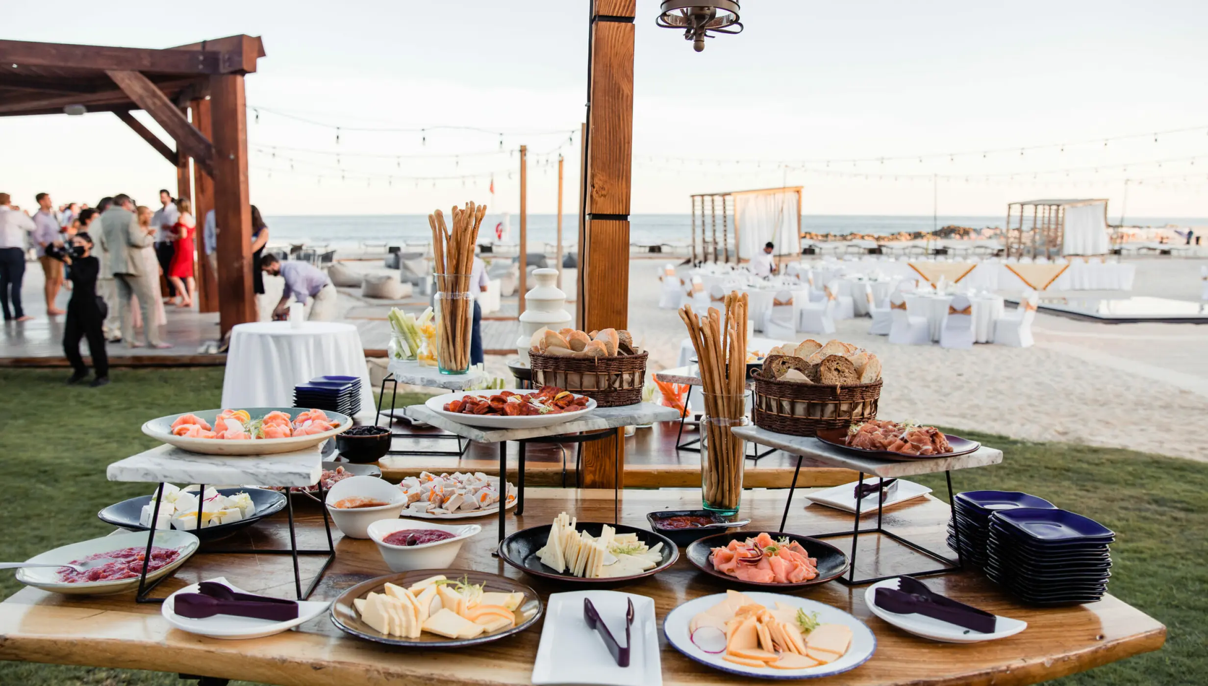 Wedding reception appetizer table with cheeses and meats at Hilton Los Cabos, Cabo San Lucas