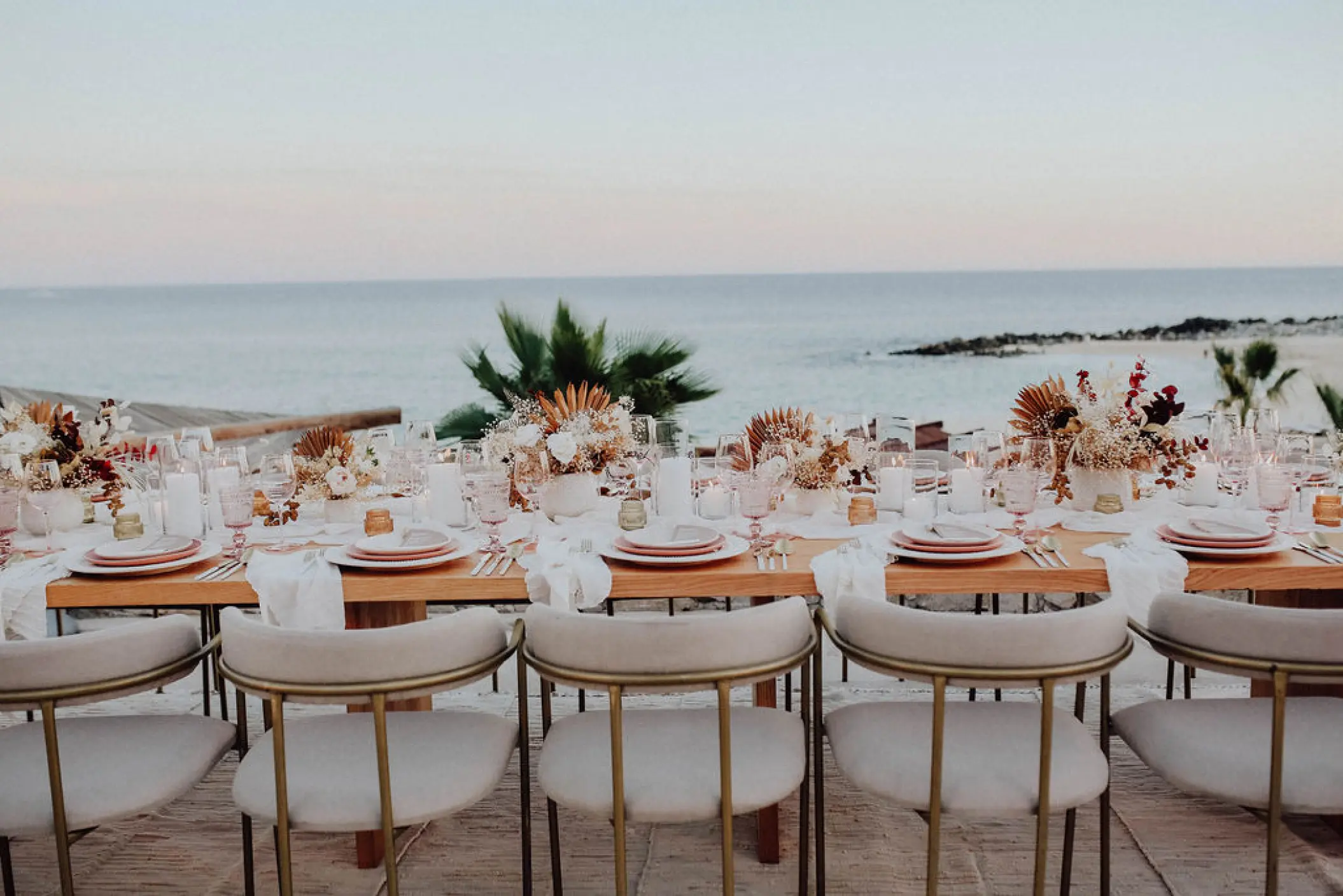 Oceanfront wedding reception table at Hilton Los Cabos, Cabo San Lucas