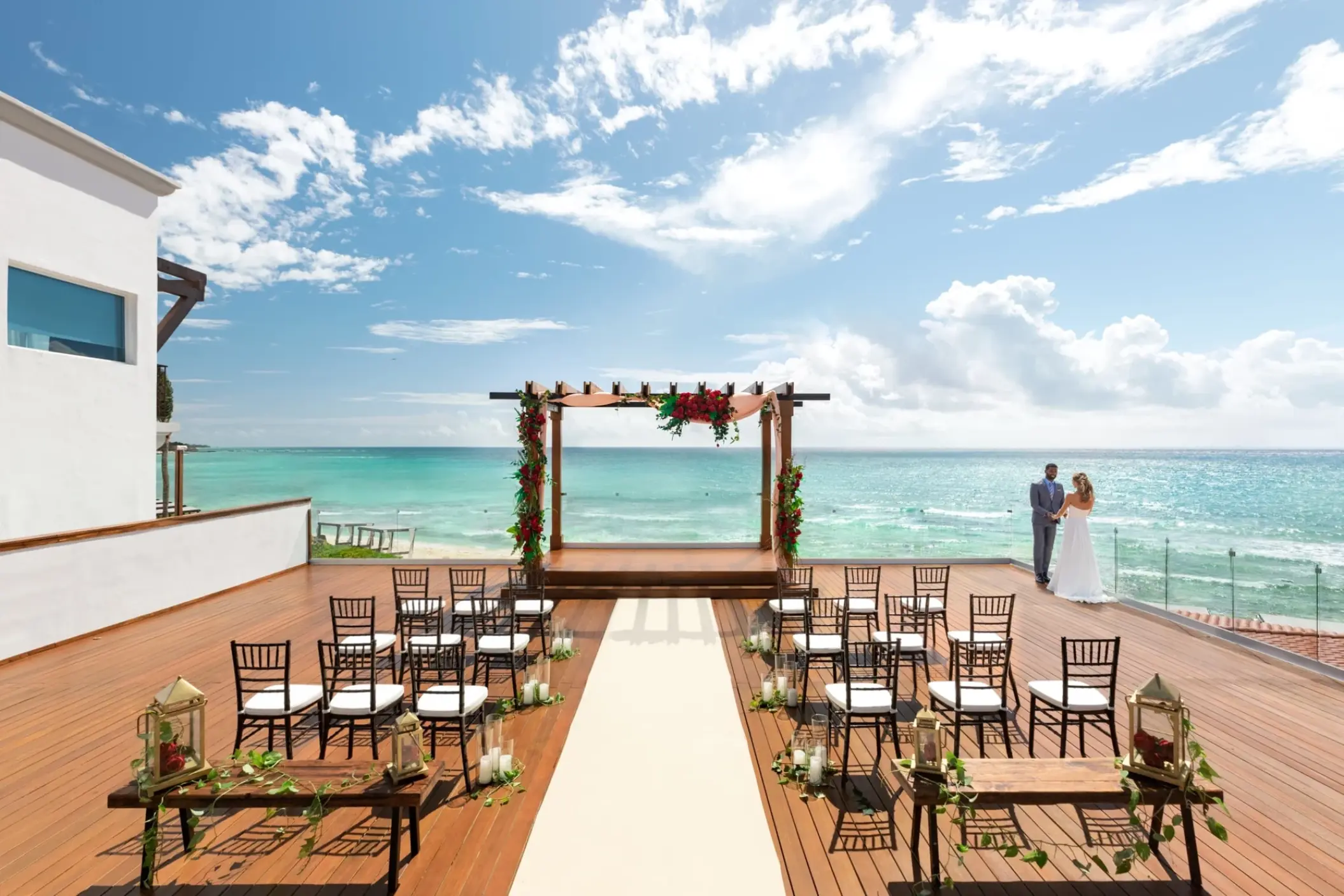 Infinity deck wedding ceremony setup at Hilton Playa del Carmen
