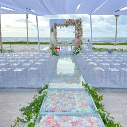 Hilton Tulum's beach venue wedding ceremony setup.