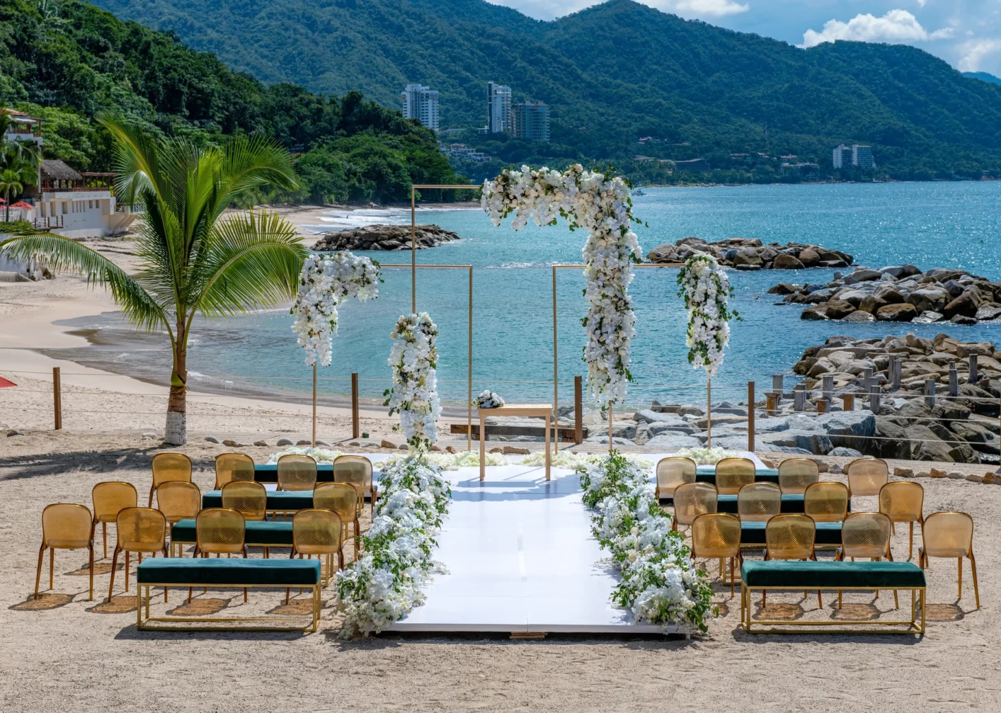 Ceremony decor on beach wedding venue at Hilton Vallarta Riviera