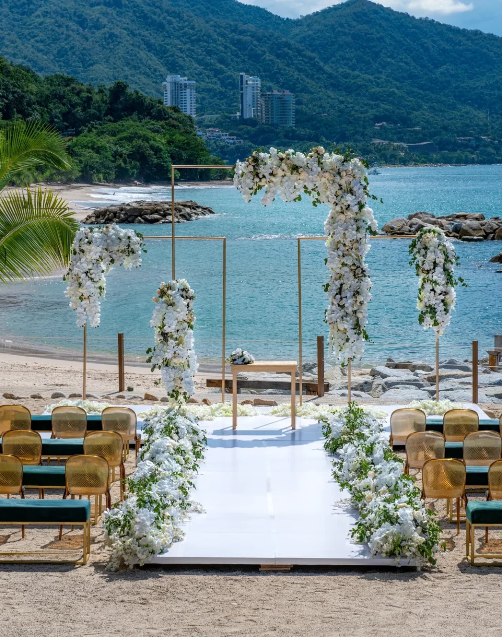 Ceremony decor on beach wedding venue at Hilton Vallarta Riviera