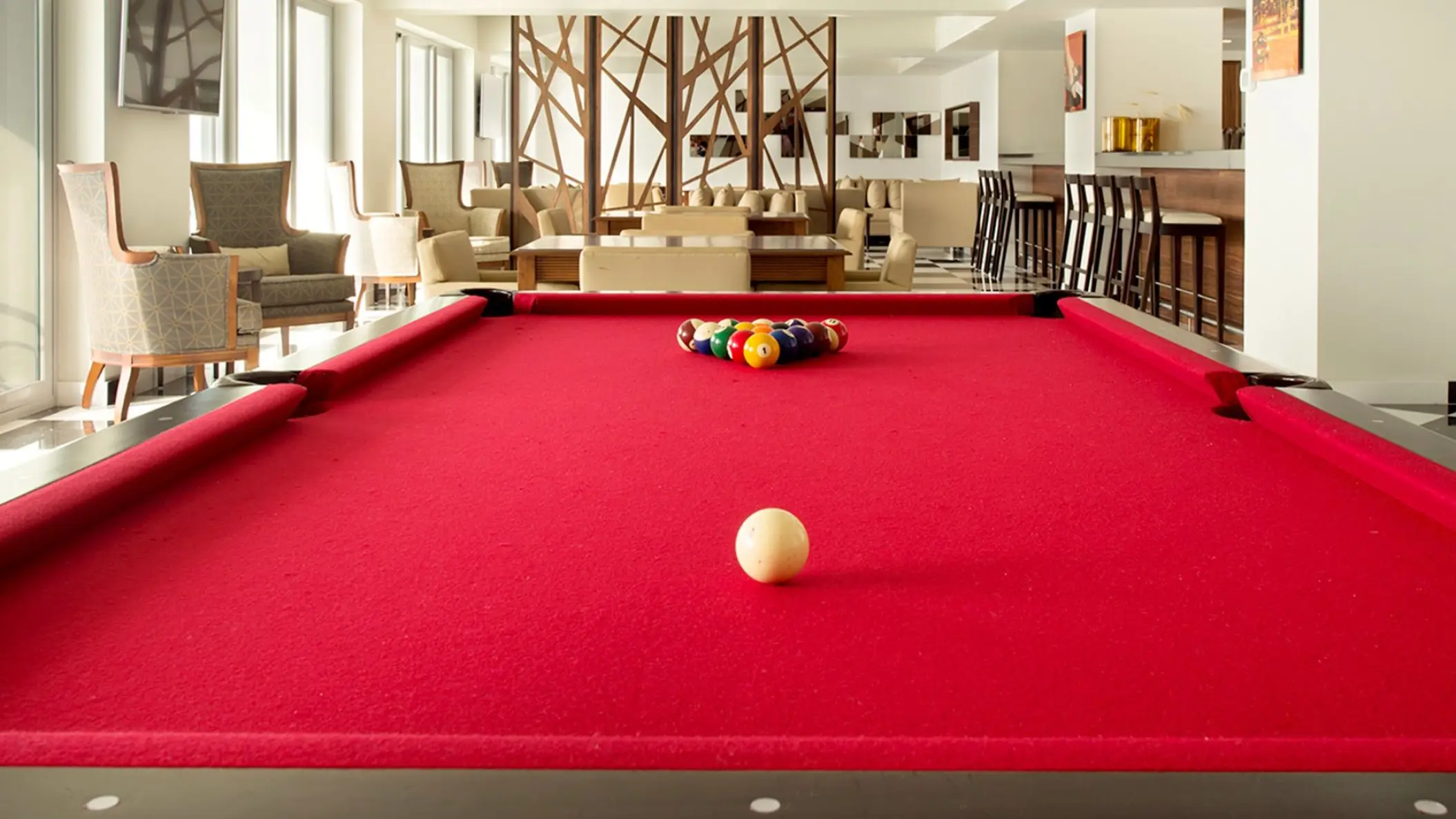 Red felt pool table in the Martini Bar at Hilton Vallarta Riviera, Puerto Vallarta