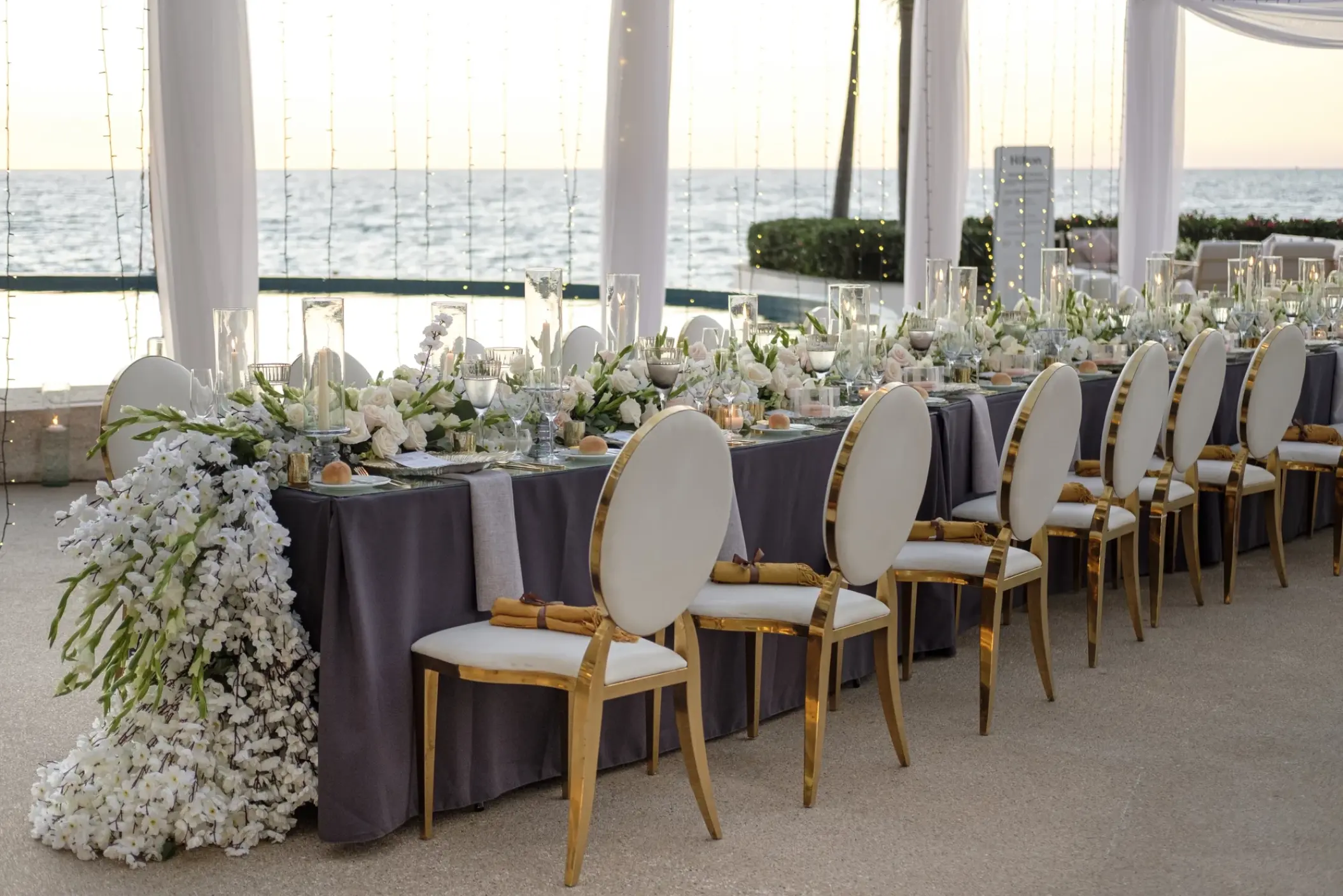 Elegant wedding reception setup on the terrace at Hilton Vallarta Riviera, Puerto Vallarta