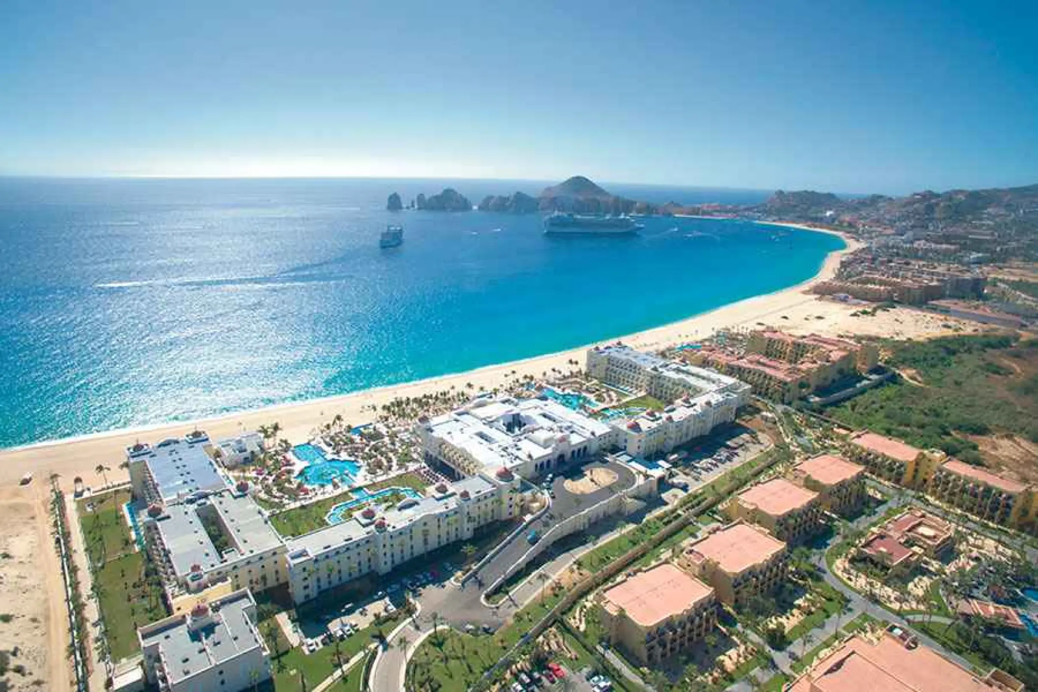 Aerial view of Riu Palace Cabo San Lucas beachfront grounds and pools, Cabo San Lucas