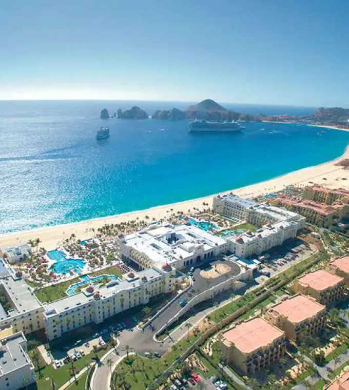 Aerial view of Riu Palace Cabo San Lucas beachfront grounds and pools, Cabo San Lucas