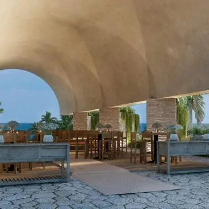 Ecumenical Temple wedding venue under a vaulted stone arch at Hotel Xcaret Arte, Riviera Maya