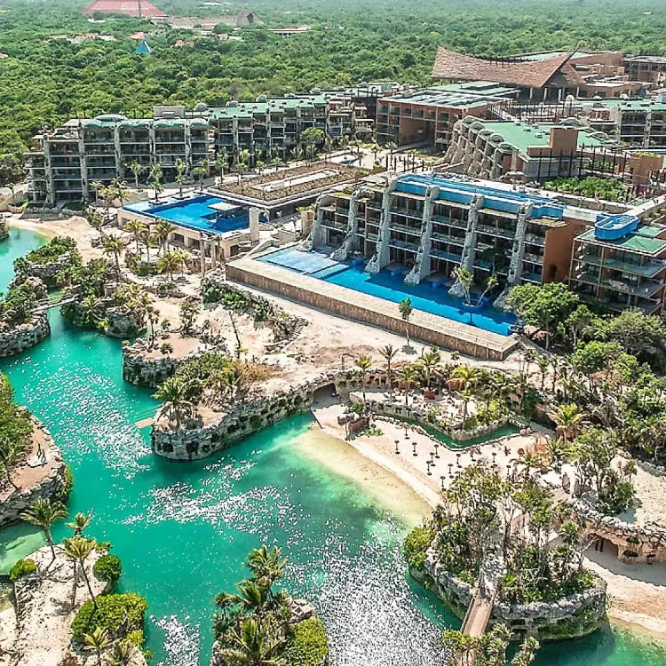 Hotel Xcaret Mexico aerial view of pools, rivers, and resort grounds, Riviera Maya