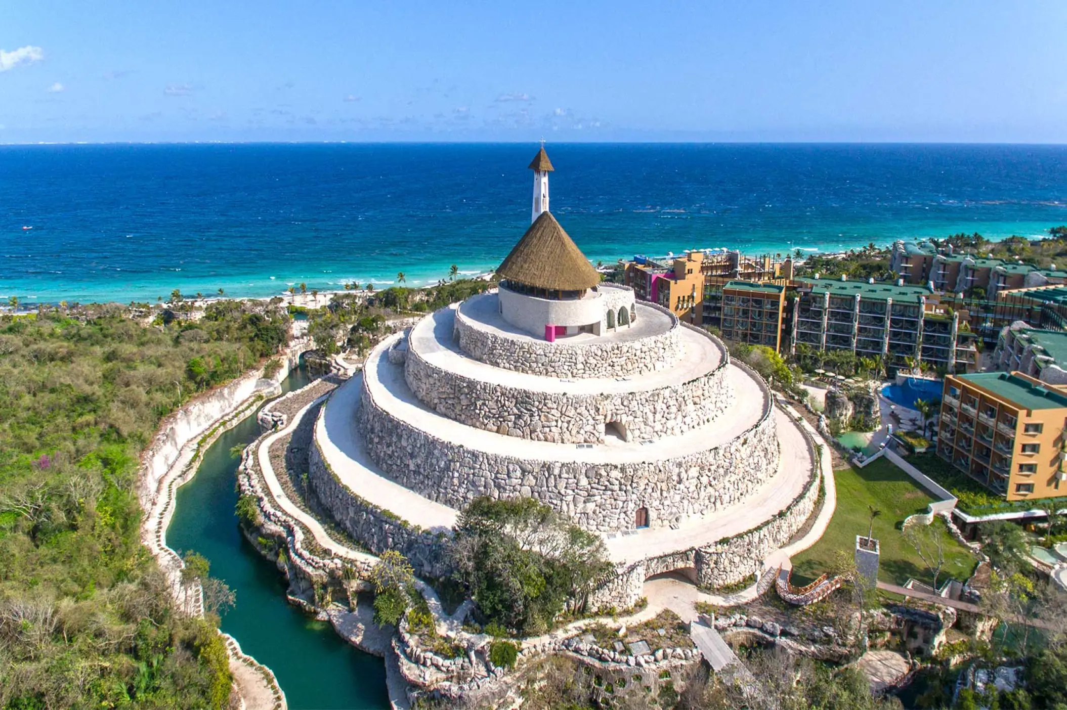 Aerial view of the stone pyramid chapel at Hotel Xcaret Mexico, Riviera Maya