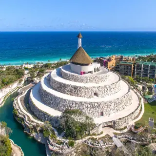 Aerial view of the stone pyramid chapel at Hotel Xcaret Mexico, Riviera Maya