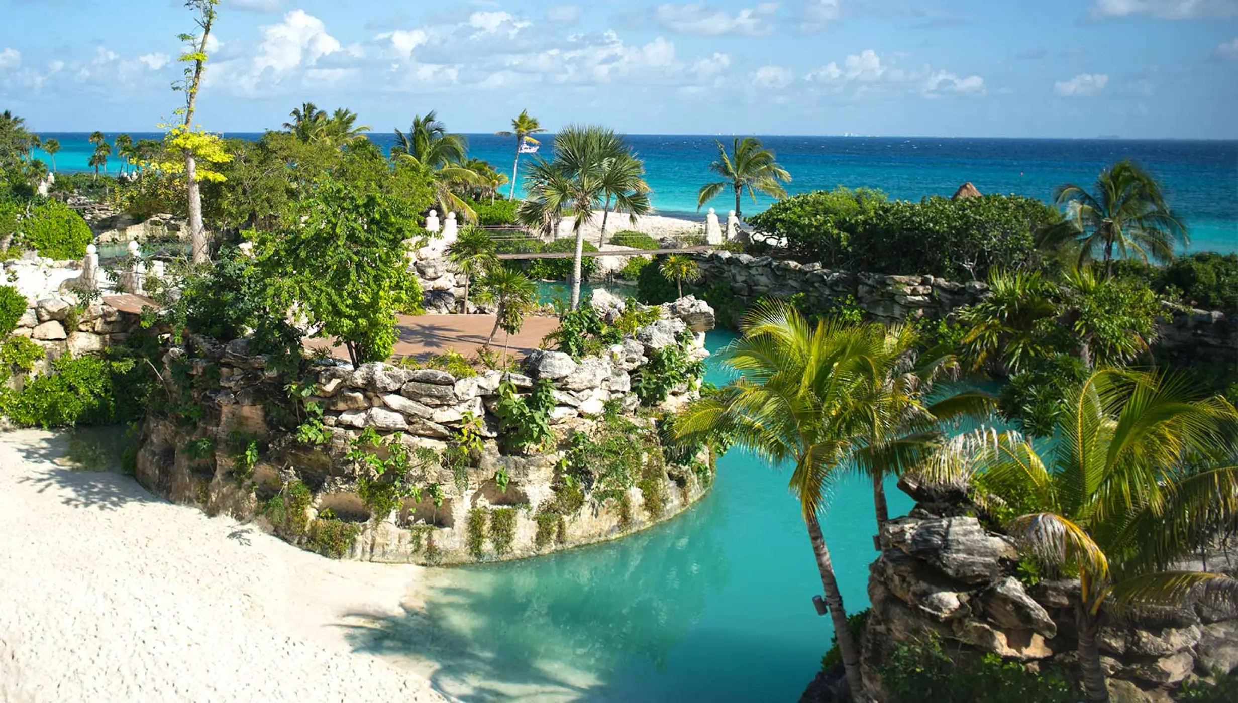 beach wedding venue area with lagoon at Hotel Xcaret Mexico