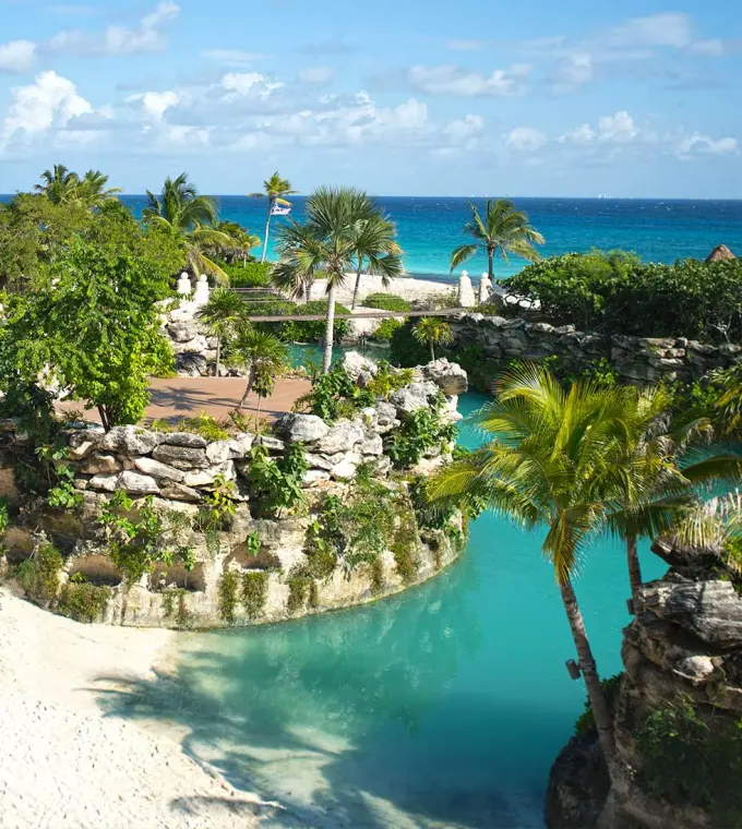 Hotel Xcaret Mexico tropical caleta inlets and stone pathways, Riviera Maya