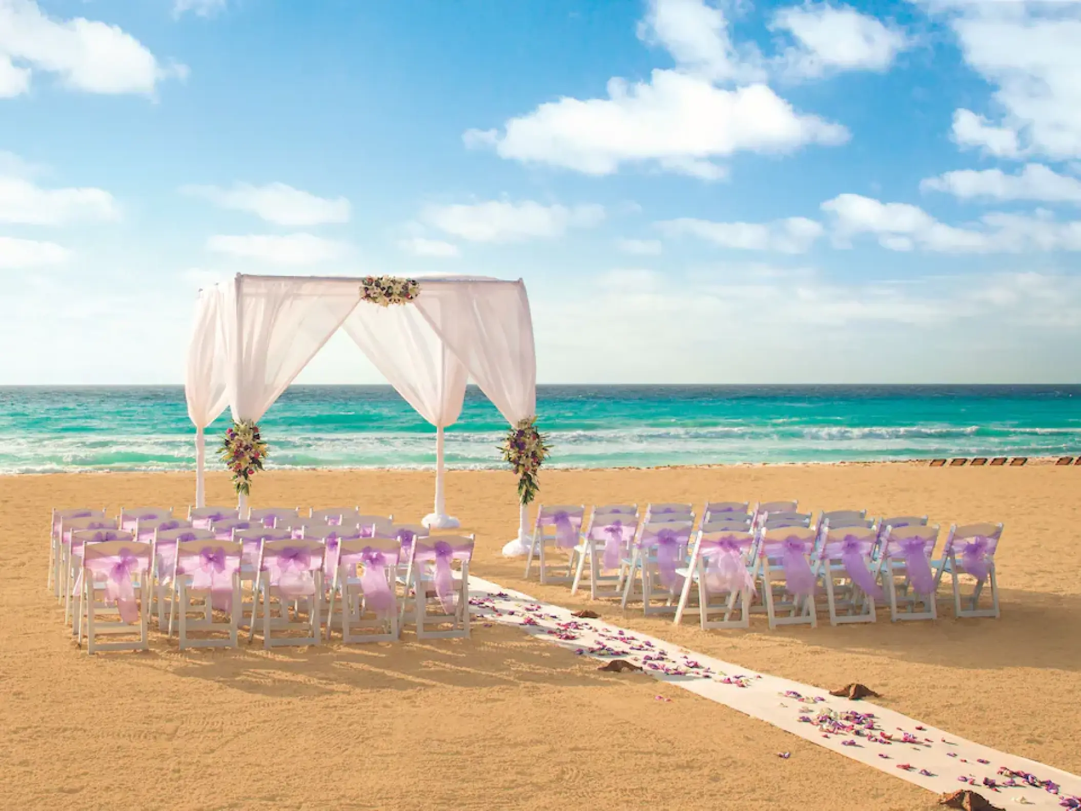 Beachfront wedding ceremony setup at Hyatt Zilara Cancun