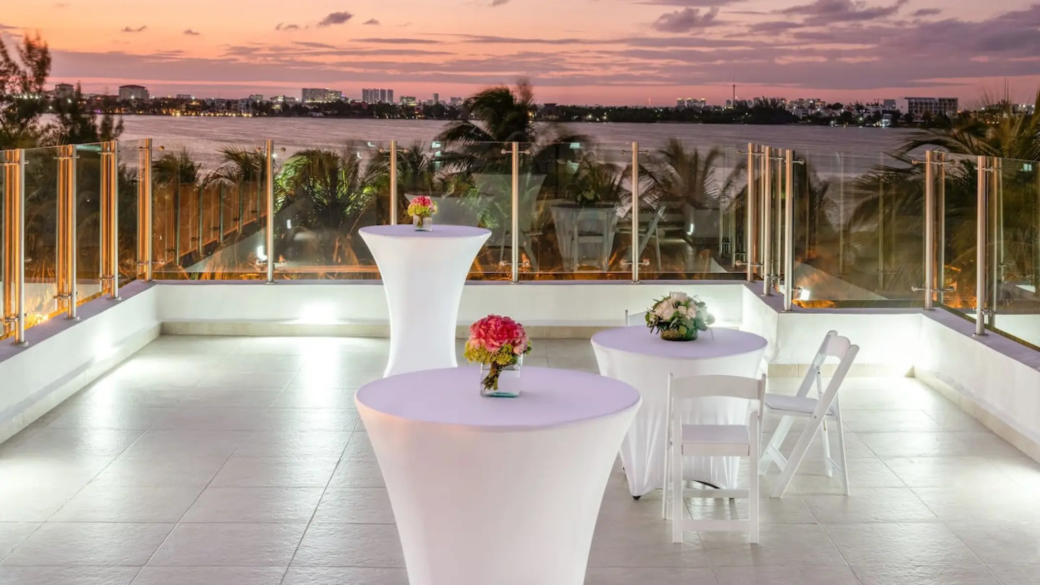 Laguna terrace wedding reception at Hyatt Zilara Cancun at sunset