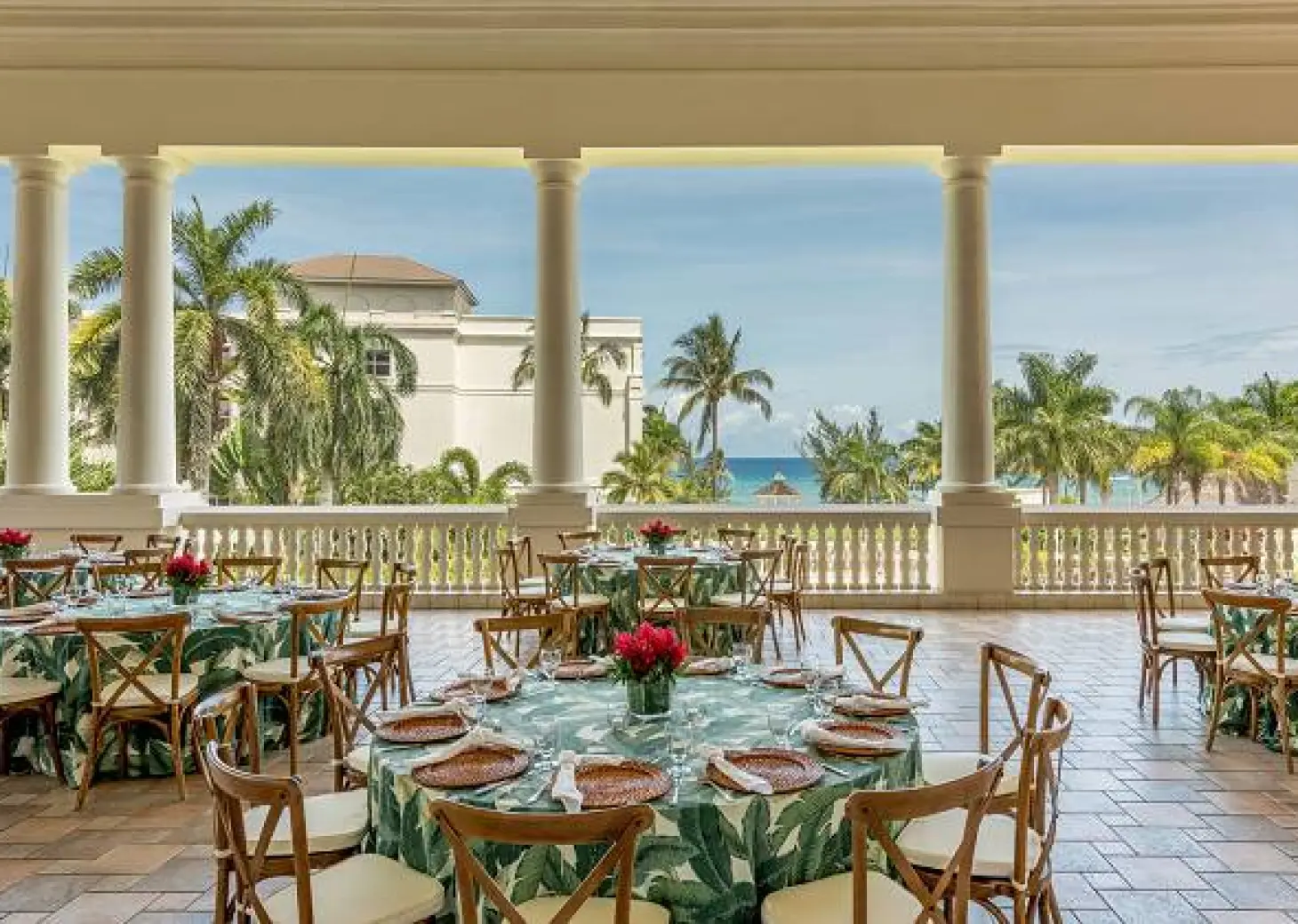 Grand Ballroom terrace wedding reception with tropical linens at Hyatt Zilara Rose Hall, Montego Bay