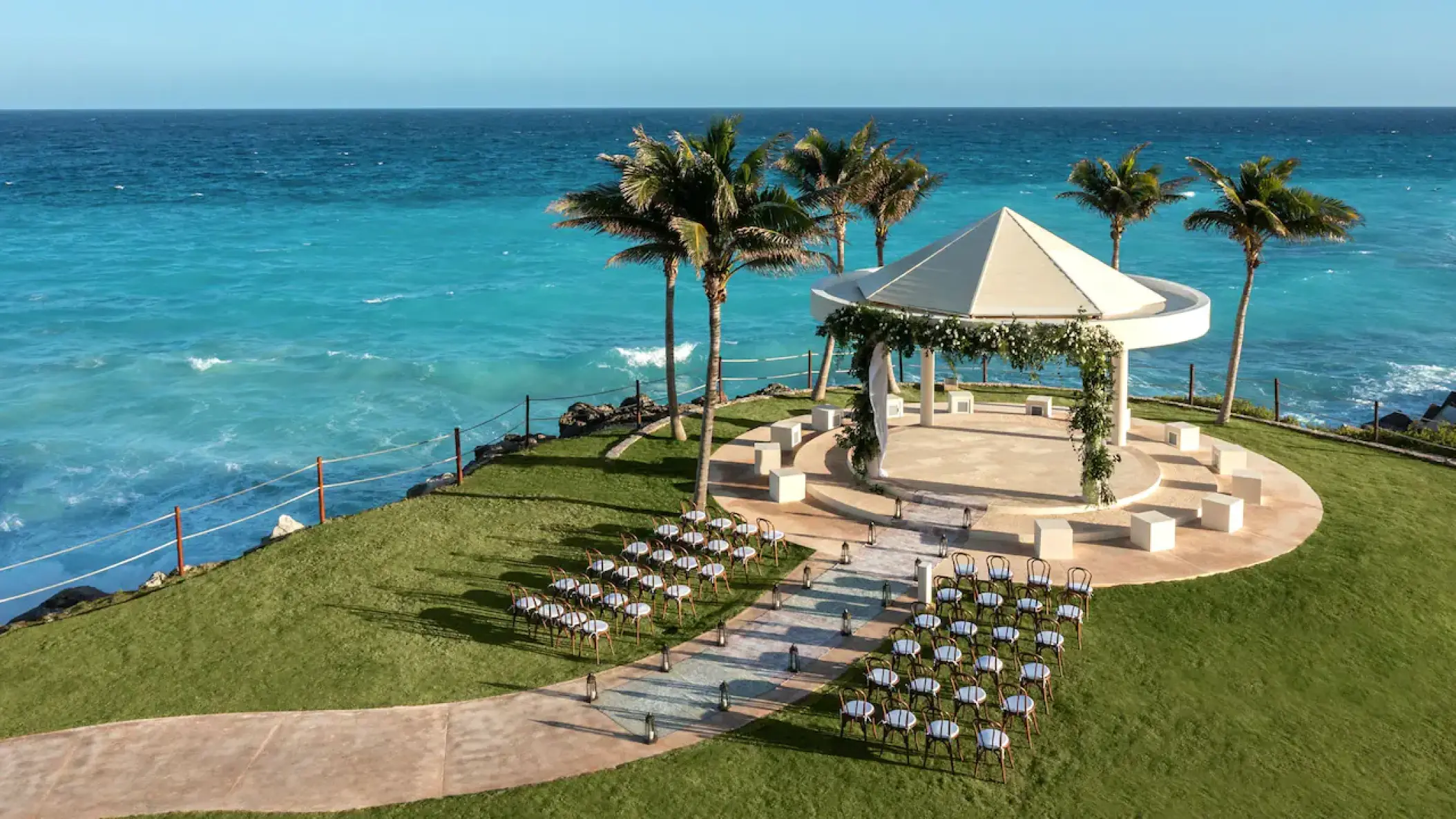 Oceanfront wedding ceremony setup at the cliffside gazebo at Hyatt Ziva Cancun