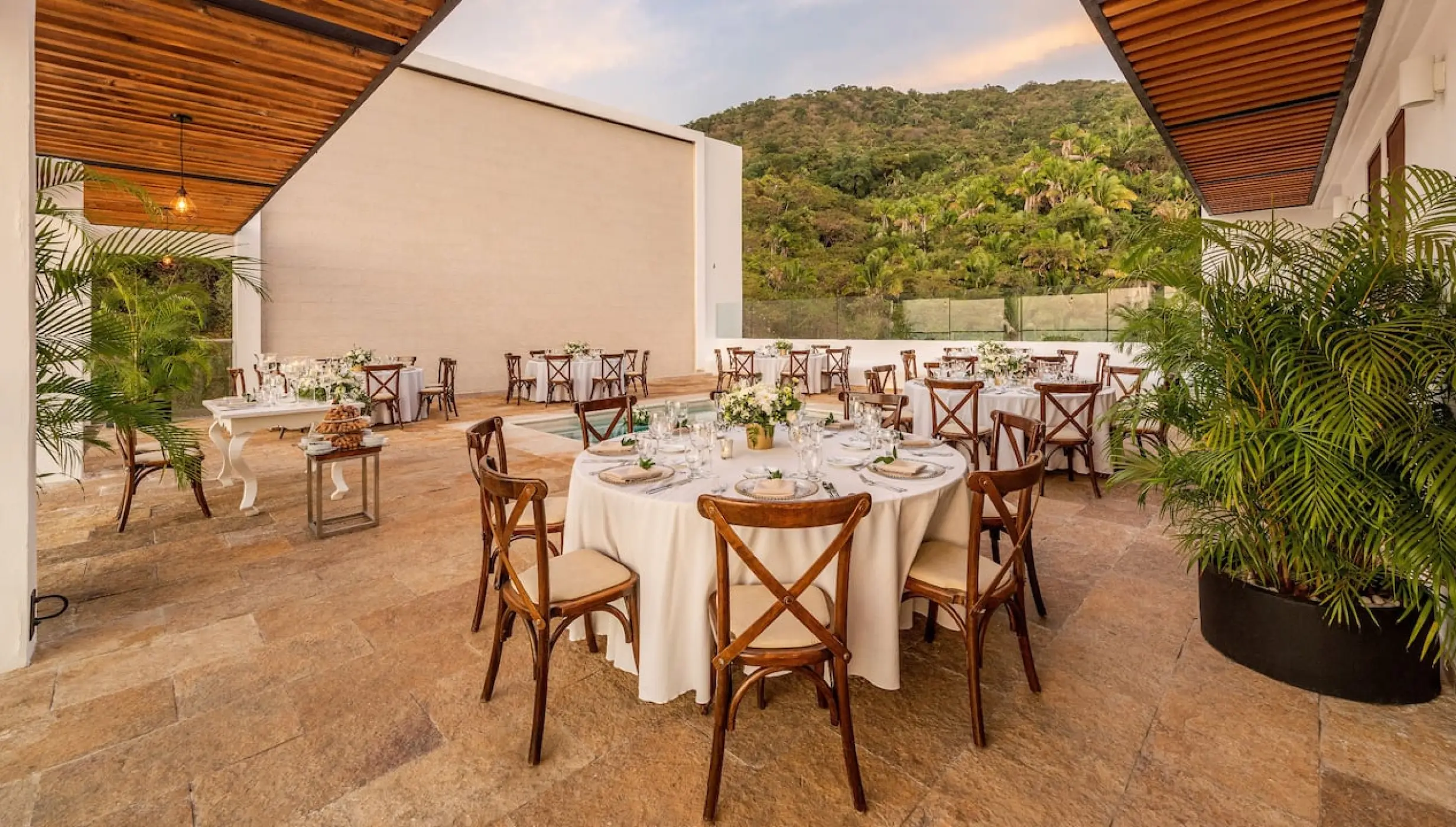 Sky Penthouse Terrace wedding reception with round tables at Hyatt Ziva Puerto Vallarta