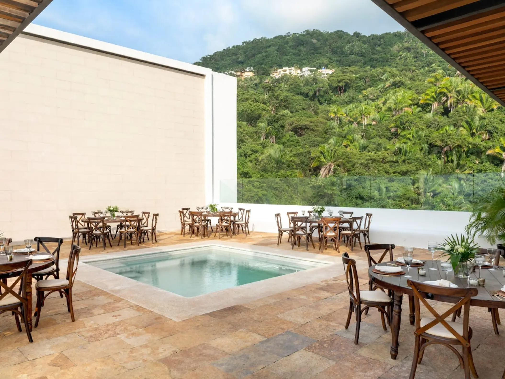 Sky penthouse terrace reception with dinner tables and pool at Hyatt Ziva Puerto Vallarta