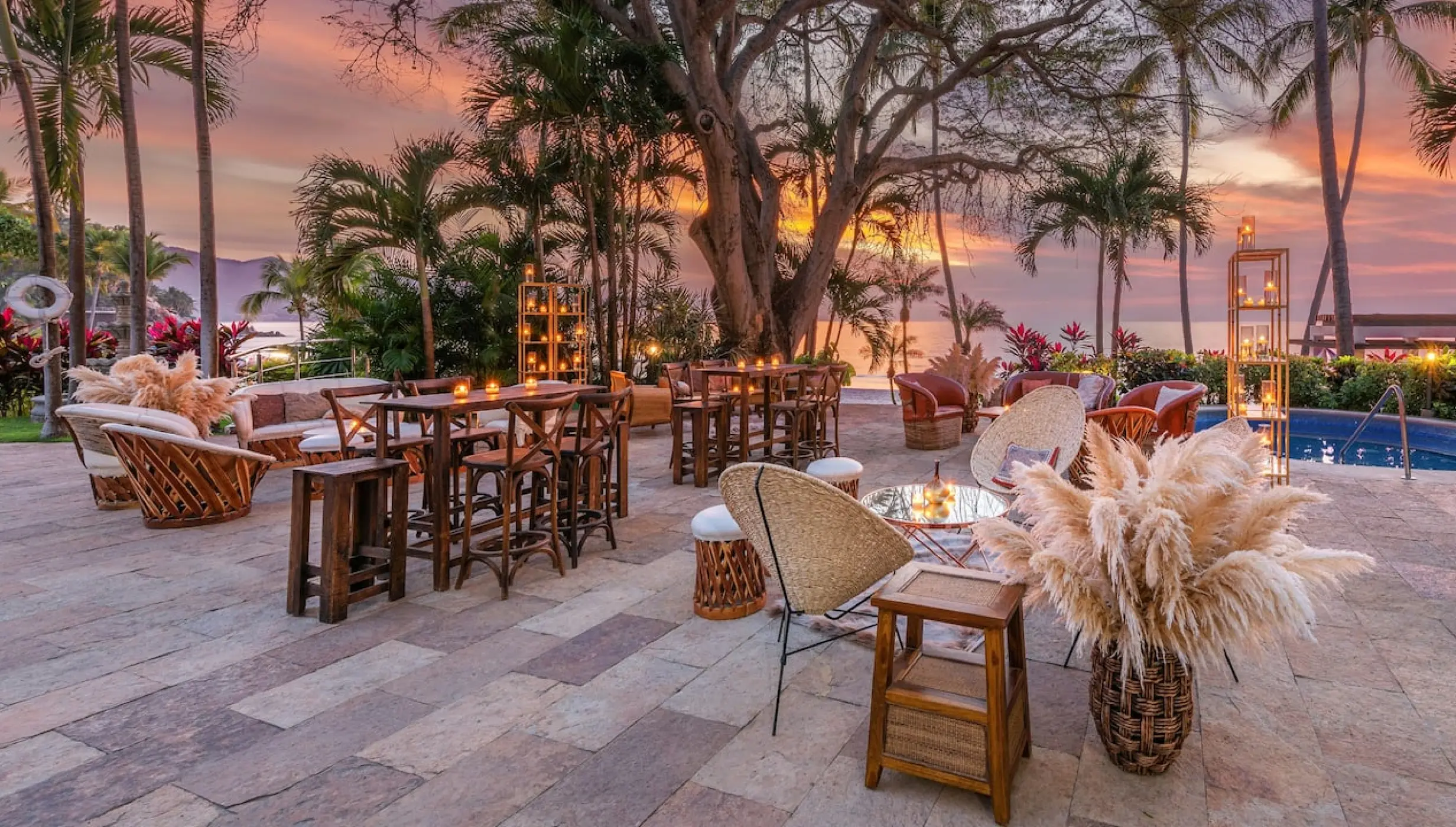 Outdoor wedding reception setup at sunset at Hyatt Ziva Puerto Vallarta