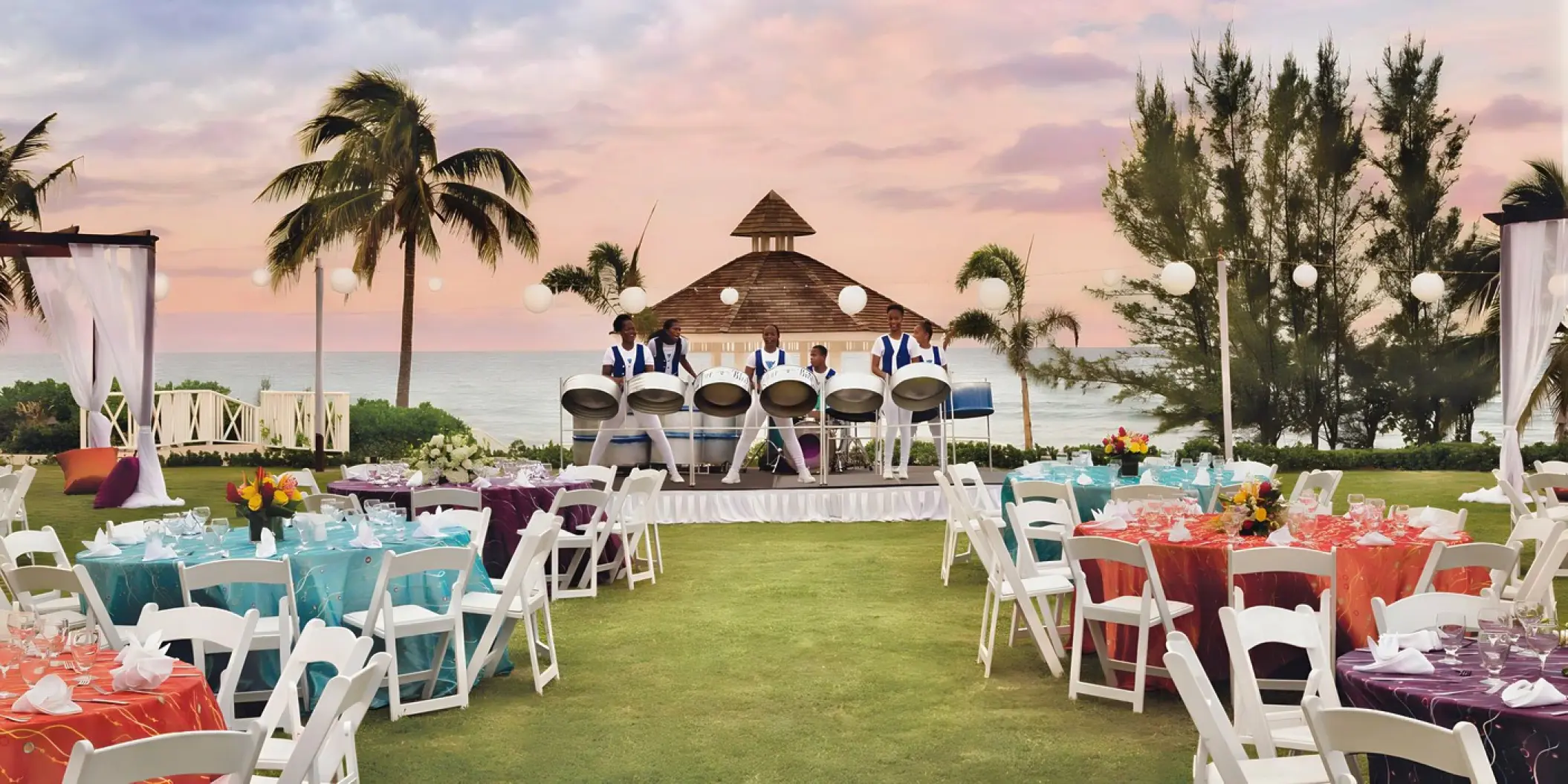 Steel drum band at an outdoor wedding reception on the lawn of Hyatt Zilara Rose Hall, Montego Bay