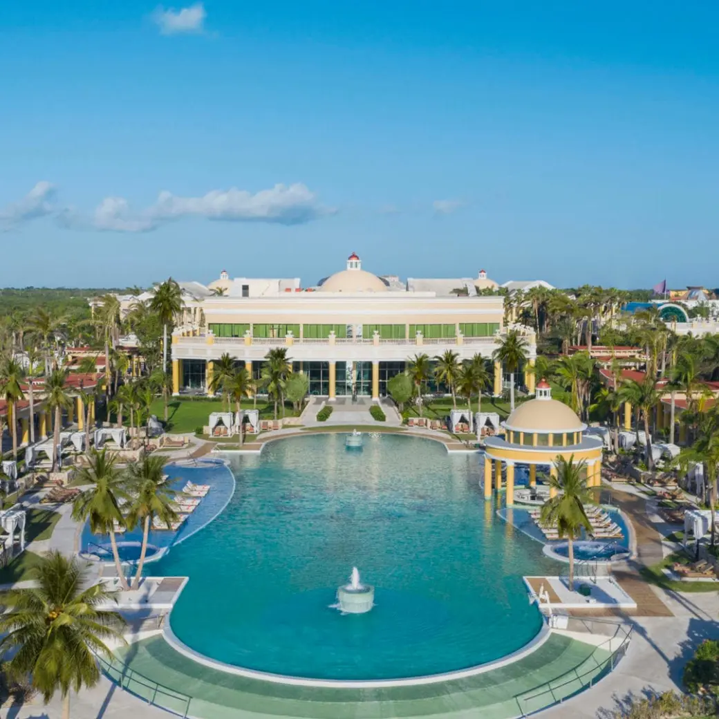 Aerial view of the main swimming pool and central building at JOIA Paraiso by Iberostar, Riviera Maya
