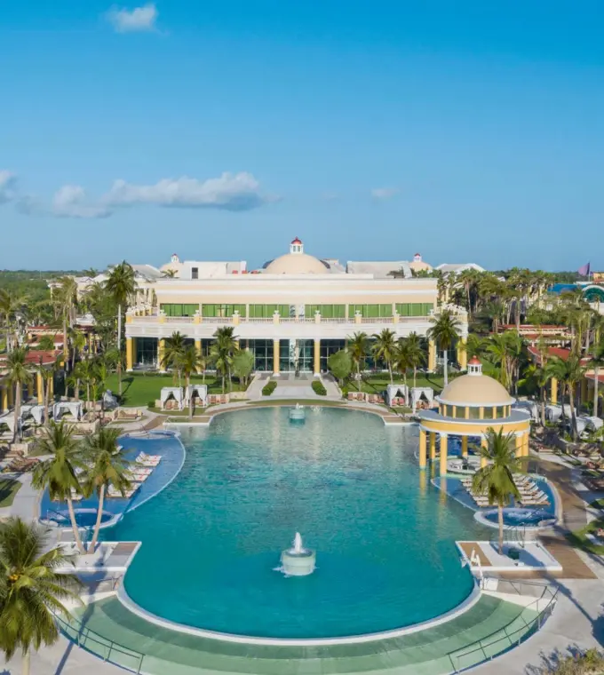 Aerial view of the main swimming pool and central building at JOIA Paraiso by Iberostar, Riviera Maya