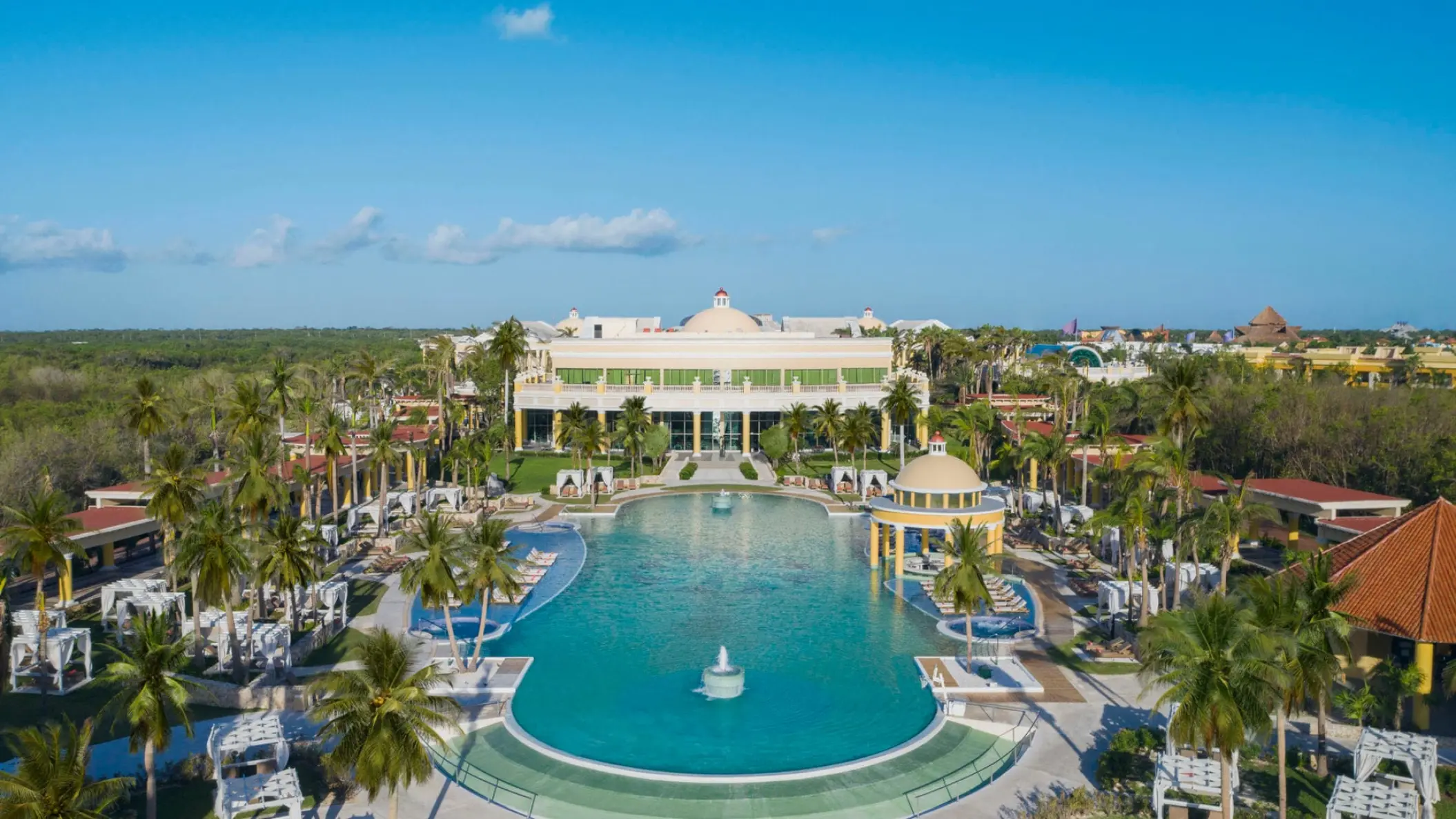 Aerial view of the main swimming pool and central building at JOIA Paraiso by Iberostar, Riviera Maya