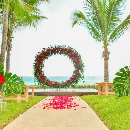 Floral circle ceremony arch overlooking the ocean at Iberostar Waves Quetzal, Playa Del Carmen