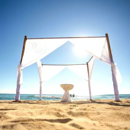 White canopy beach ceremony setup at Iberostar Paraiso Del Mar, Riviera Maya