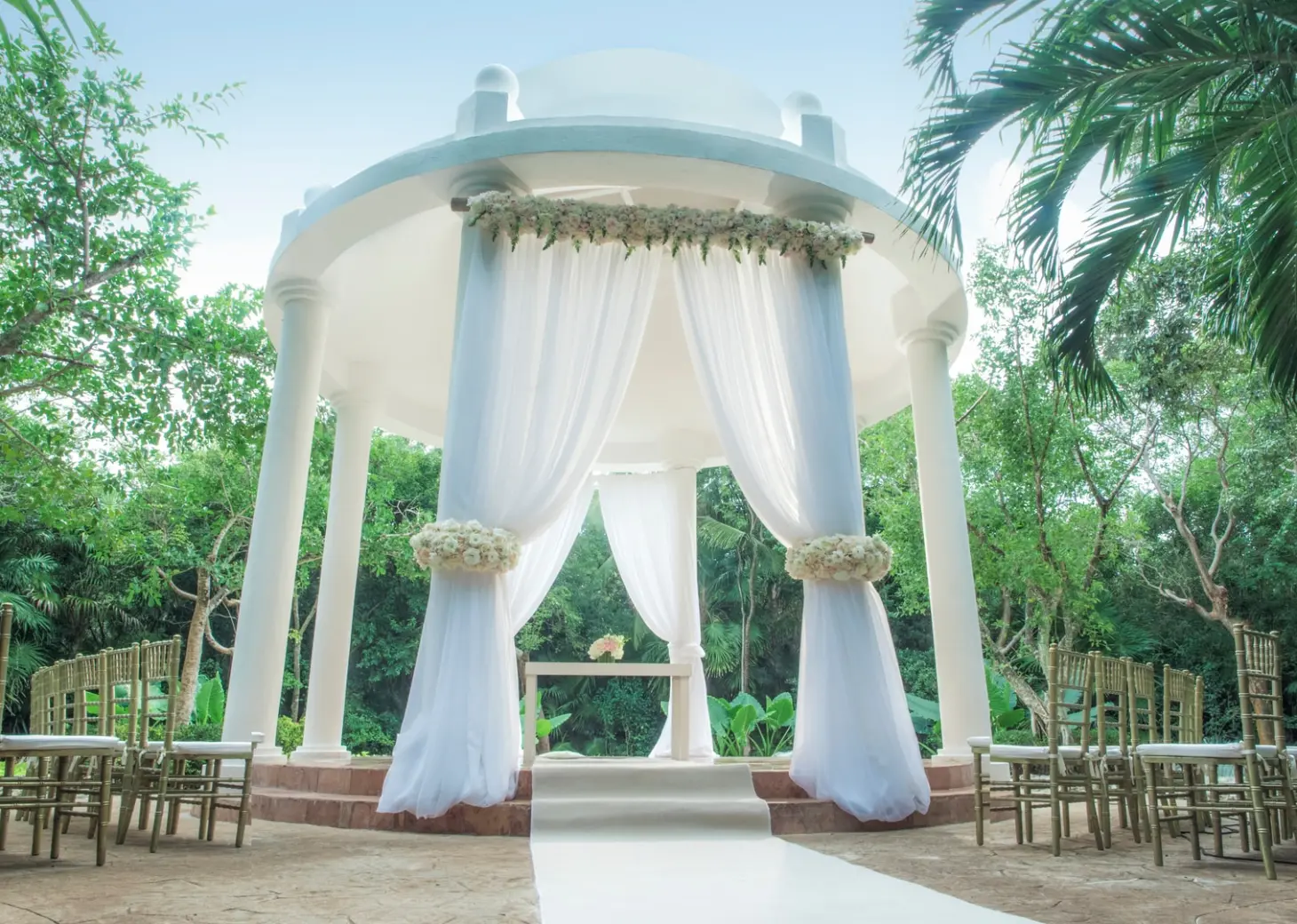 White garden gazebo wedding ceremony at Iberostar Paraiso Beach, Riviera Maya