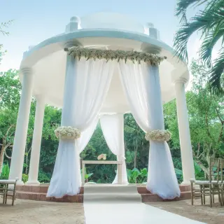 White garden gazebo wedding ceremony at Iberostar Paraiso Beach, Riviera Maya