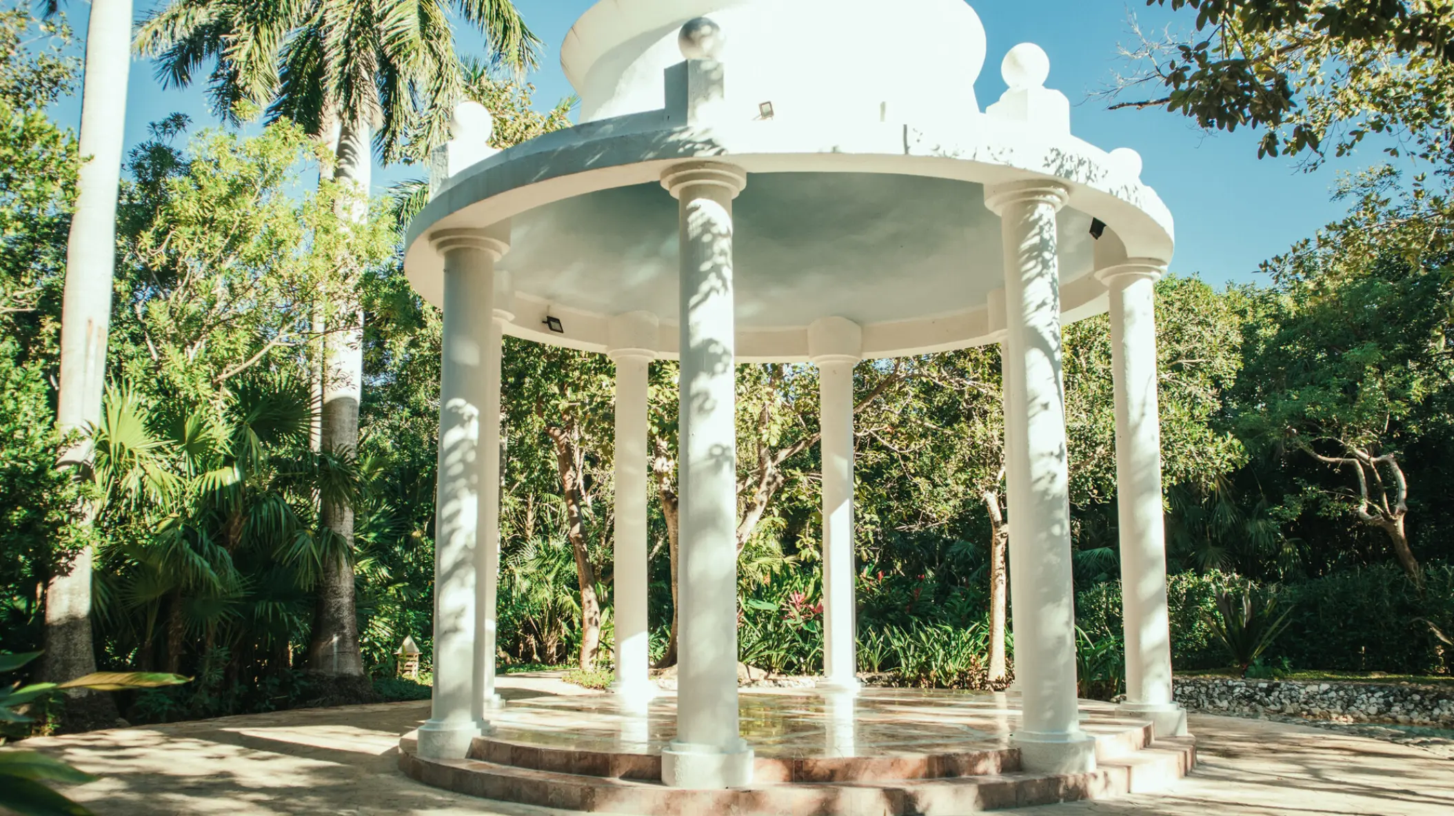 White garden gazebo for a wedding ceremony at Iberostar Paraiso Beach, Riviera Maya