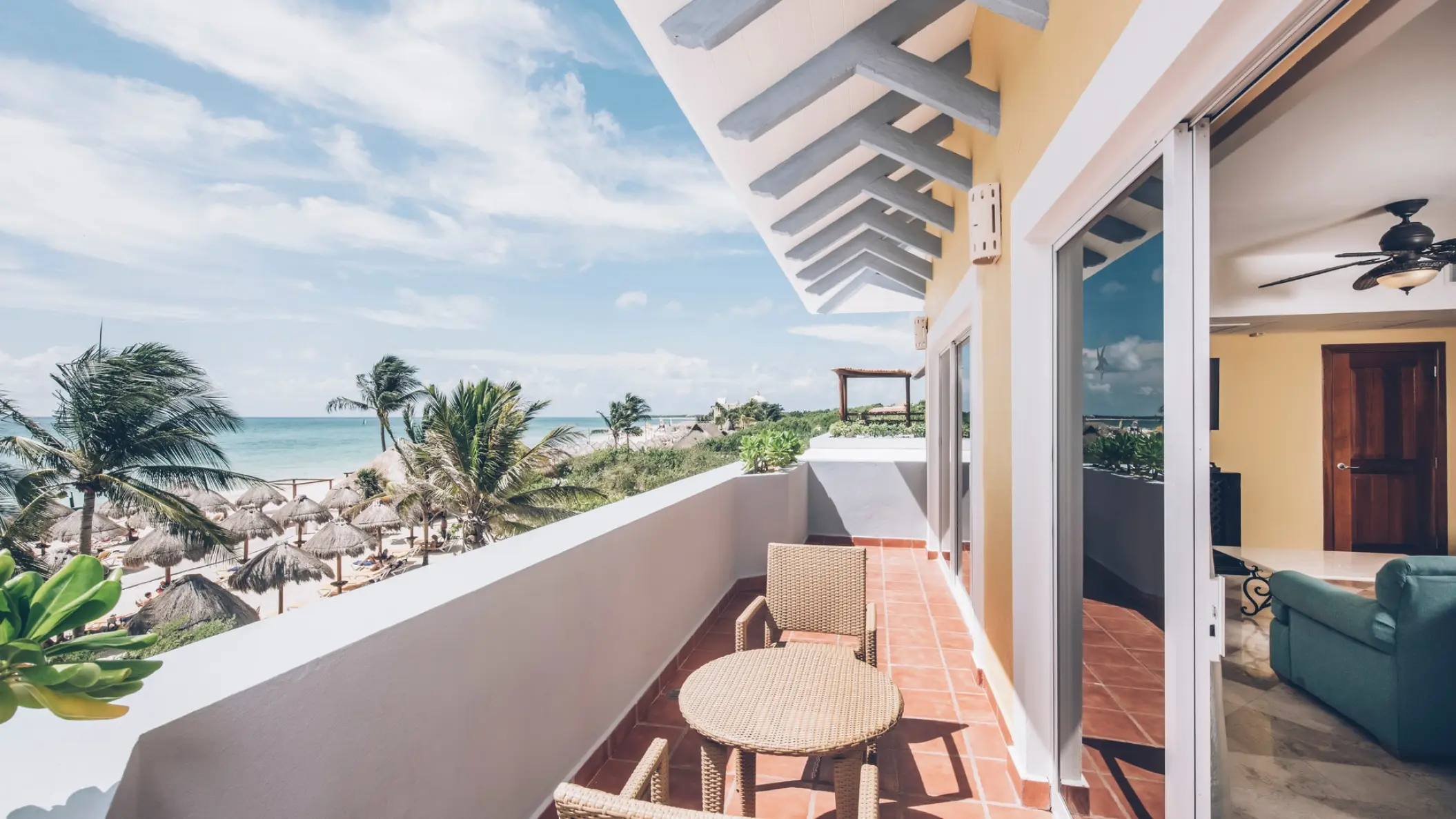 Private suite balcony with seating overlooking the beach at Iberostar Paraiso Del Mar, Riviera Maya