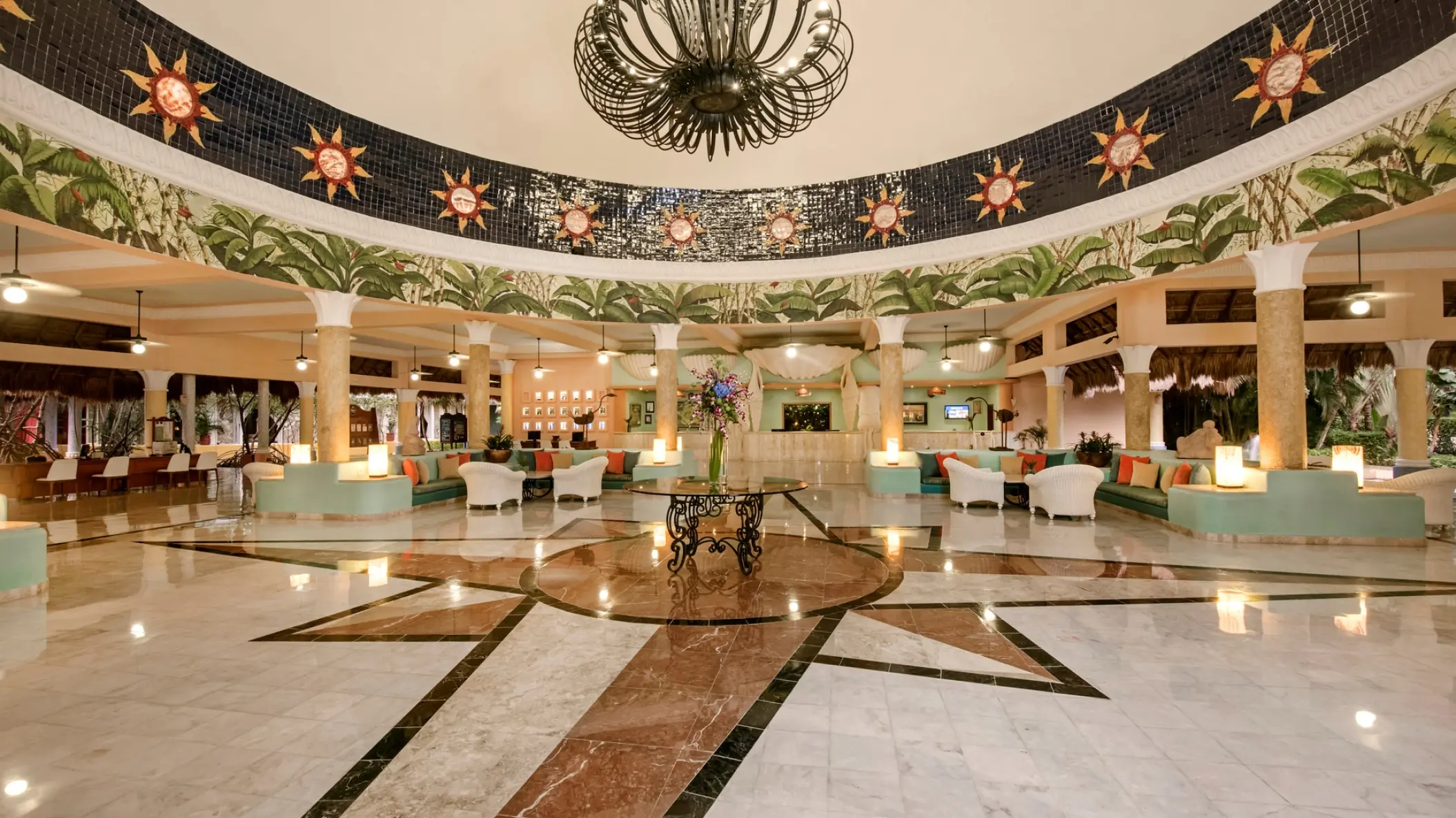 Grand lobby with domed ceiling and sun motifs at Iberostar Paraiso Del Mar, Riviera Maya