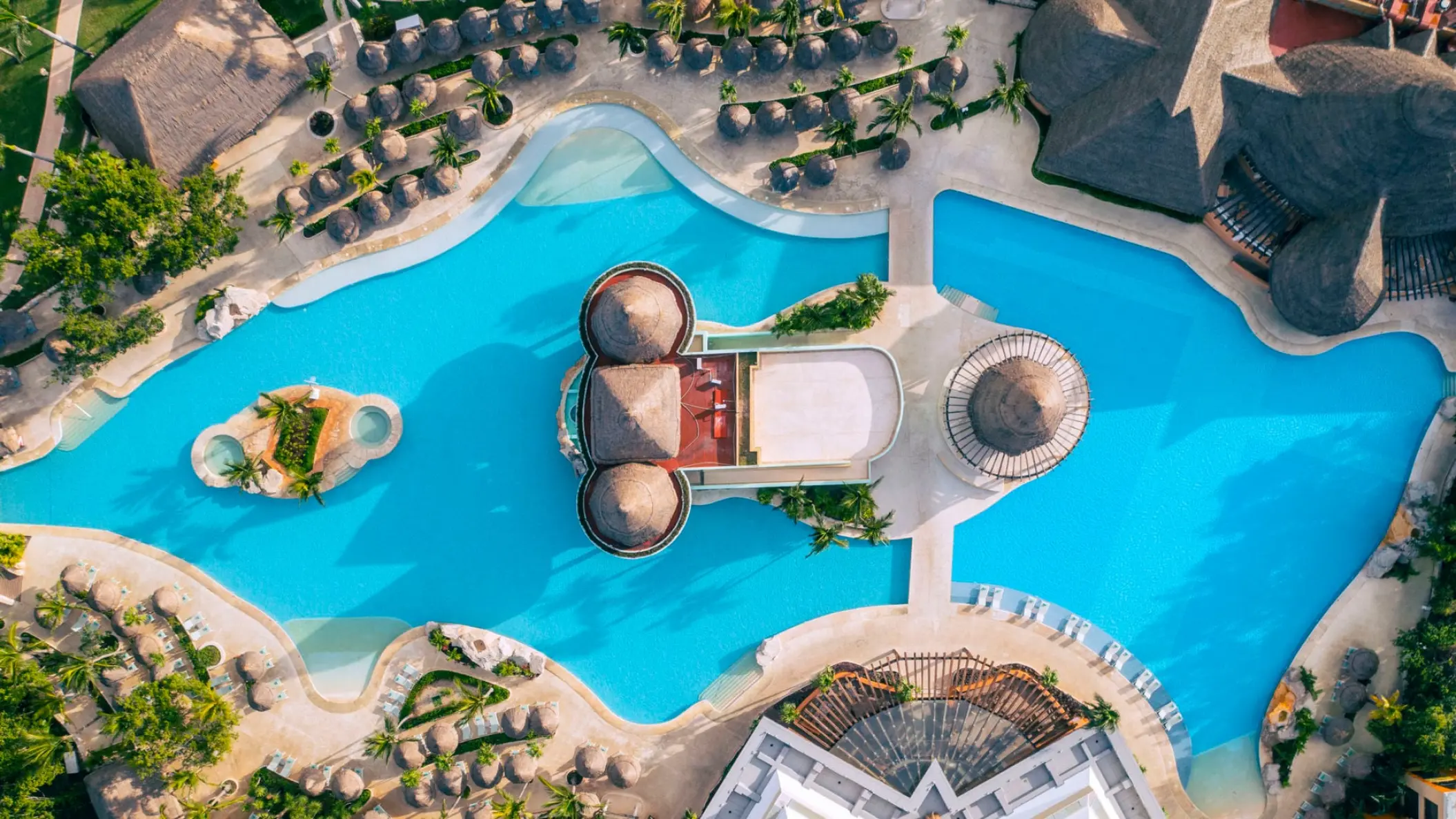Aerial view of the large swimming pool complex at Iberostar Selection Paraiso Maya, Riviera Maya