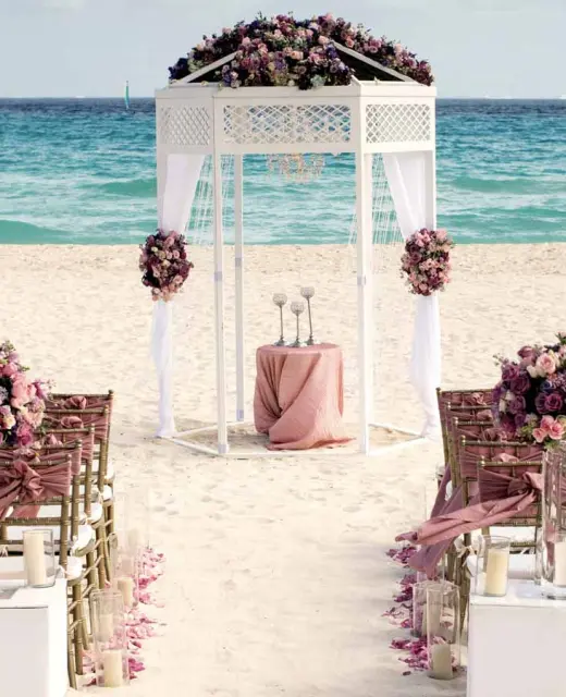 Iberostar Quetzal beach wedding venue with chairs and altar