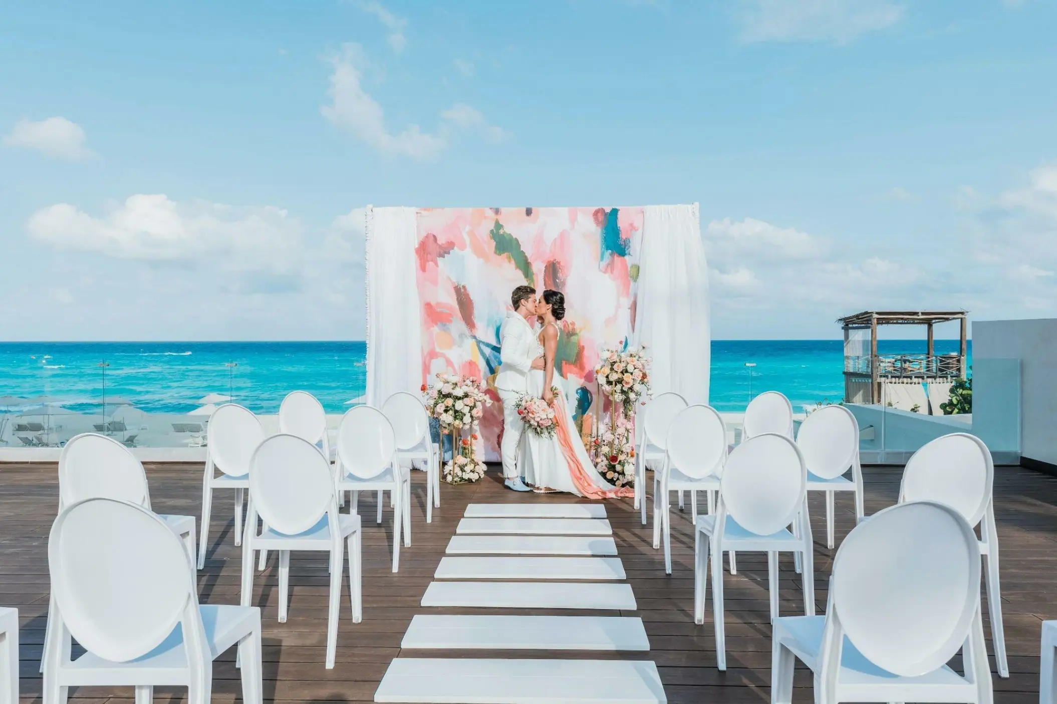 Terrace wedding ceremony at Iberostar Selection Cancun overlooking the Caribbean Sea