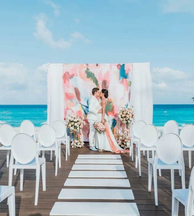 Terrace wedding ceremony at Iberostar Selection Cancun overlooking the Caribbean Sea